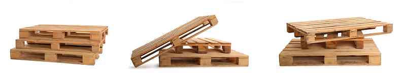 three stacks of wood pallets on a white background