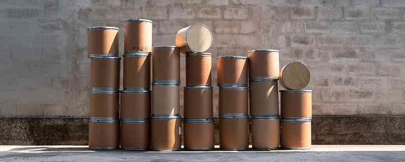 Photo of stacks of fiber drums