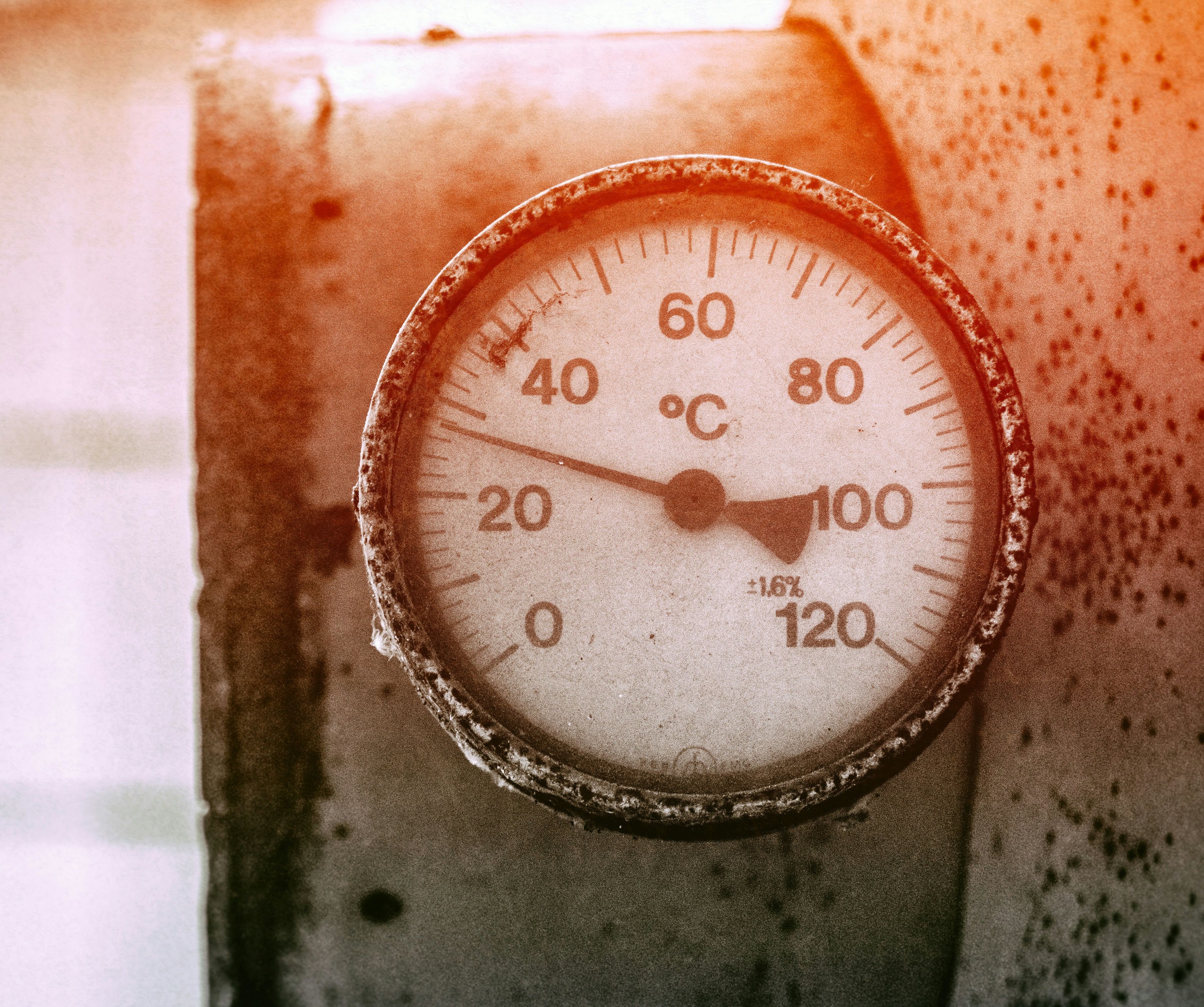 Hygrometer mounted near stored fiber drums in a warehouse