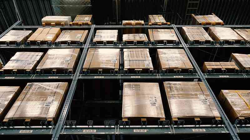 Gaylord boxes on racks in a warehouse