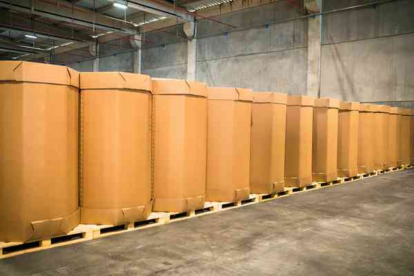Large warehouse with stacked boxes on pallets
