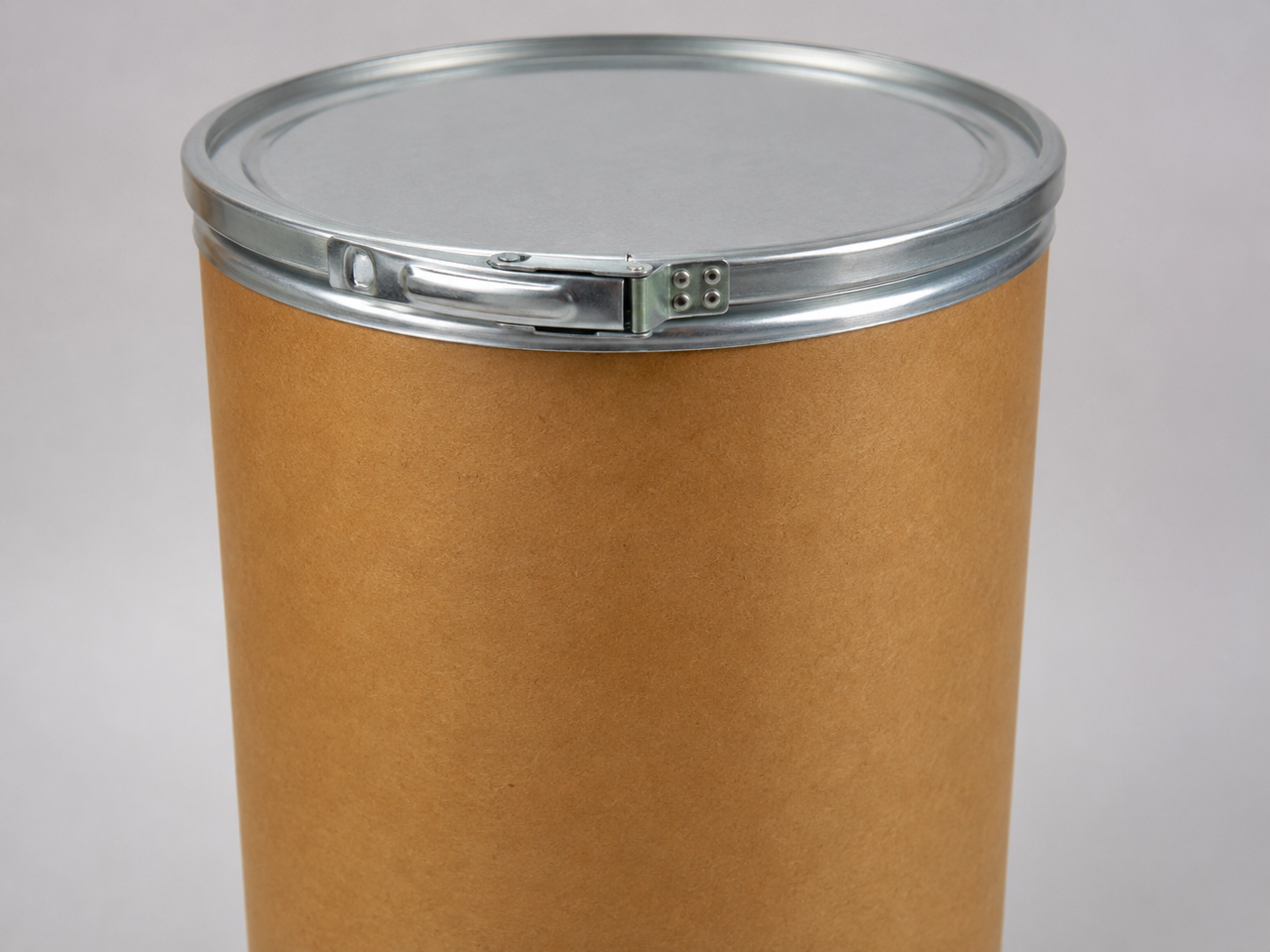 Close-up of a 30 gallon fiber drum with its lever lock ring cover