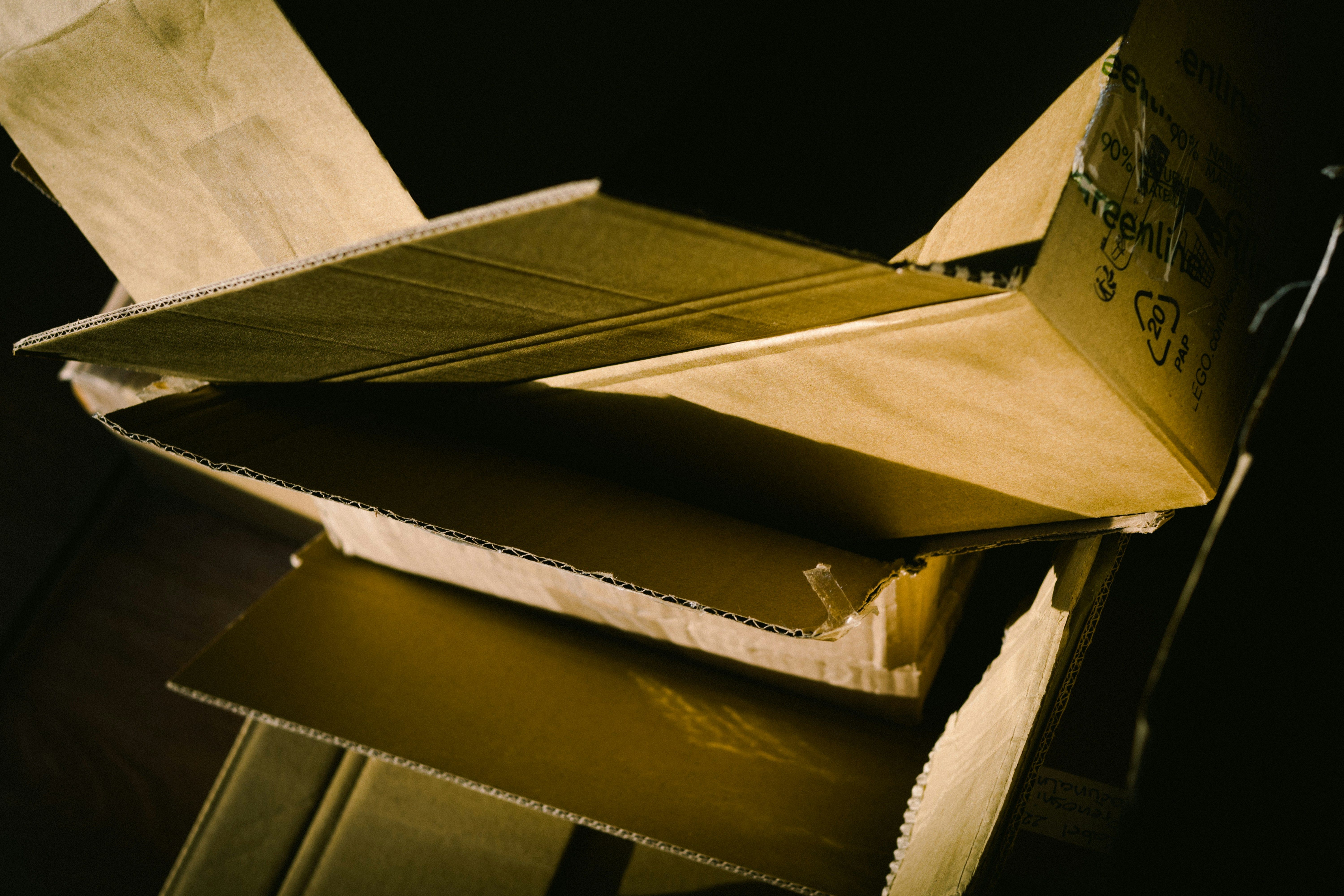 Abstract arrangement of layered cardboard pieces showing multiple wall construction