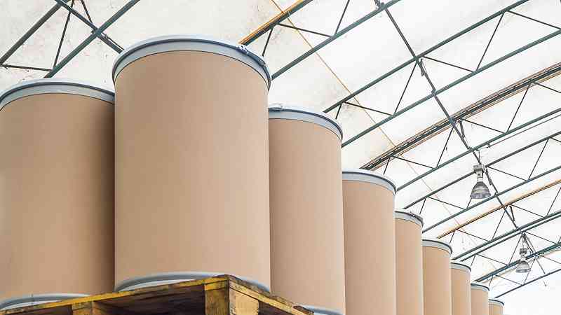 Photo of fiber drums stacked on pallets