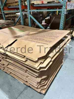Stacked corrugated cardboard boxes in a warehouse