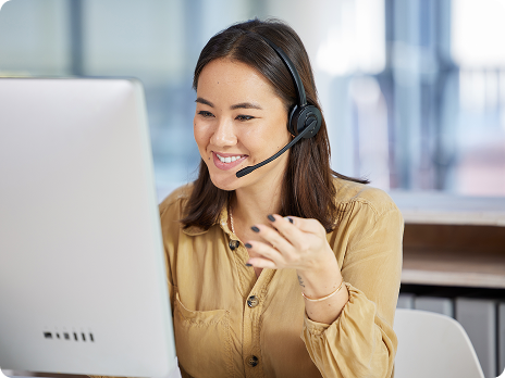 Photo of a woman speaking on a headset