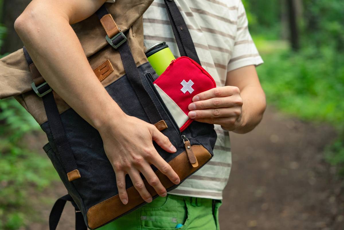 A full water bottle and a first aid kit. Always prepared, never overpacked.