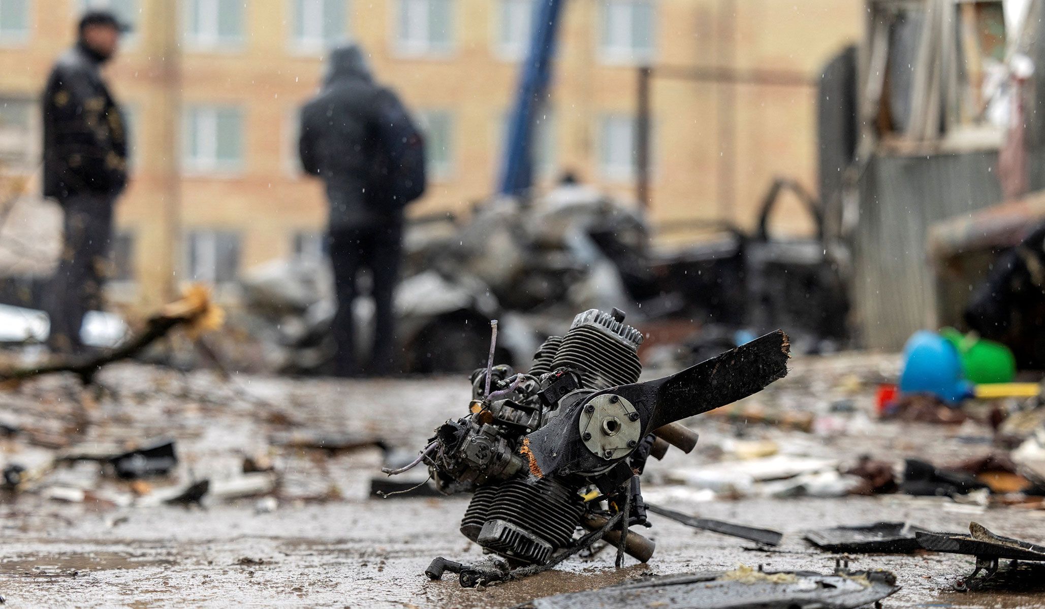 The engine of a Russian drone lies at the impact site in a residential neighborhood in Vyshneve, outside Kyiv, Ukraine, April 3, 2026.