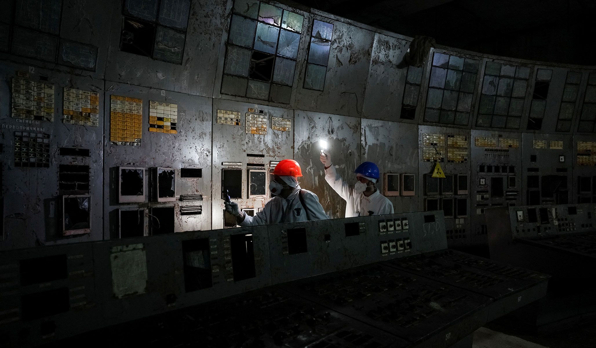 A journalist visits at a control center of the damaged fourth reactor at the Chernobyl nuclear power plant in Kyiv Region, Ukraine, April 22, 2026.
