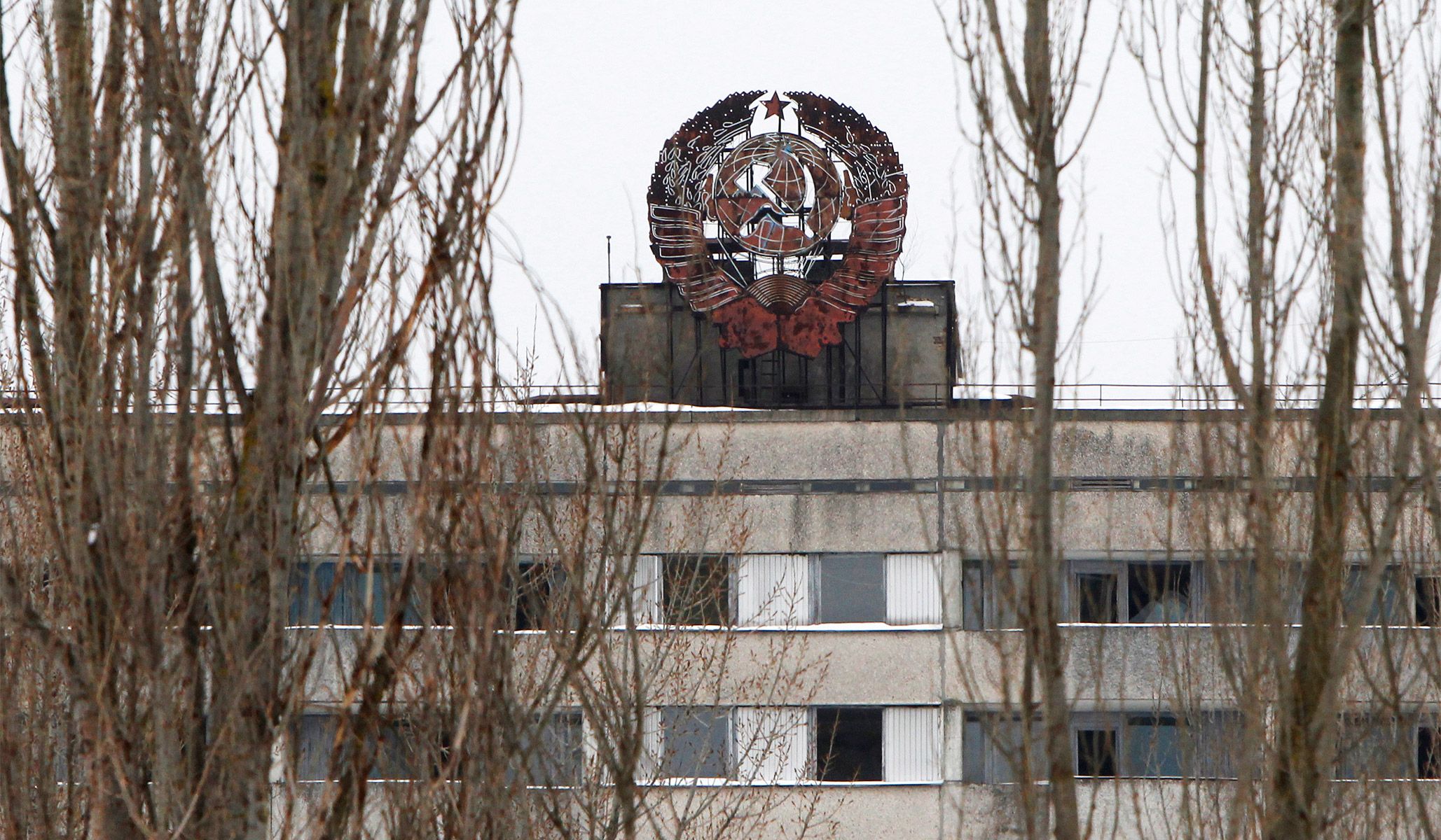 The coat of arms of the Soviet Union on a building in the abandoned city of Pripyat near the Chernobyl nuclear power plant in Ukraine February 24, 2011.