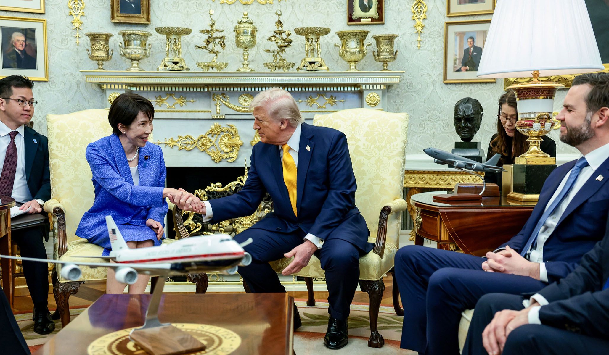 President Donald Trump shakes hands with Japanese Prime Minister Sanae Takaichi in the Oval Office, March 19, 2026.