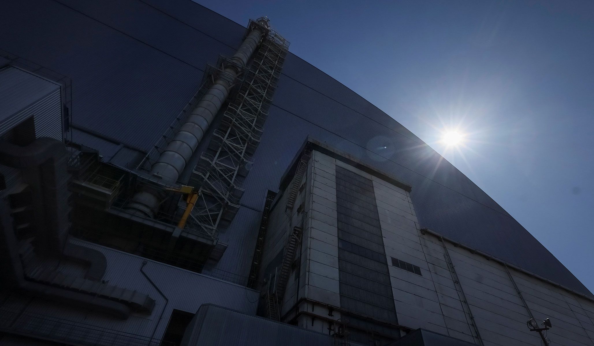 The New Safe Confinement Structure that covers the old sarcophagus which confines the remains of the damaged fourth reactor at the Chernobyl nuclear power plant in Kyiv Region, Ukraine, April 22, 2026.