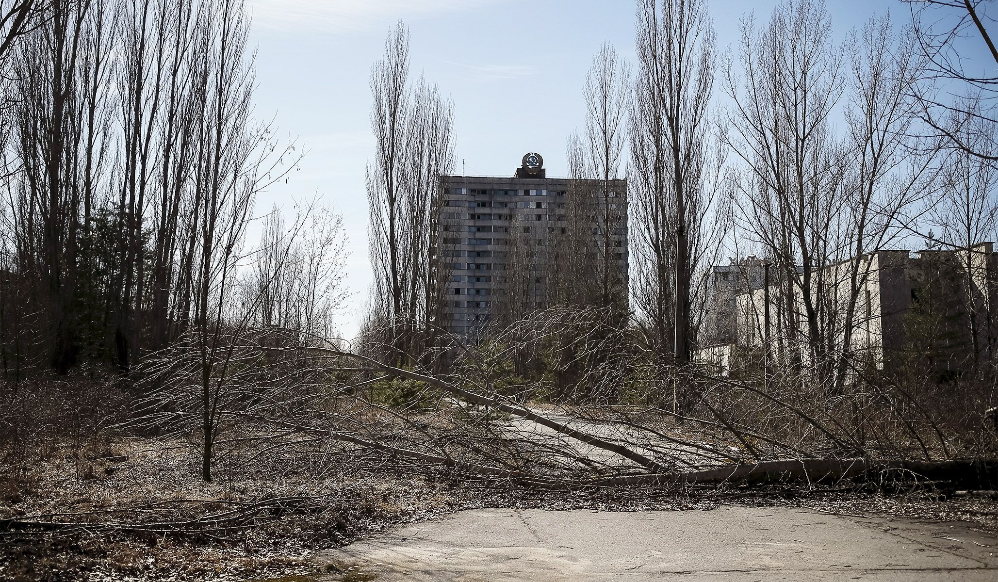 The coat of arms of the former Soviet Union on the top of a building in the abandoned city of Pripyat near Chernobyl nuclear power plant in Ukraine, March 28, 2016.