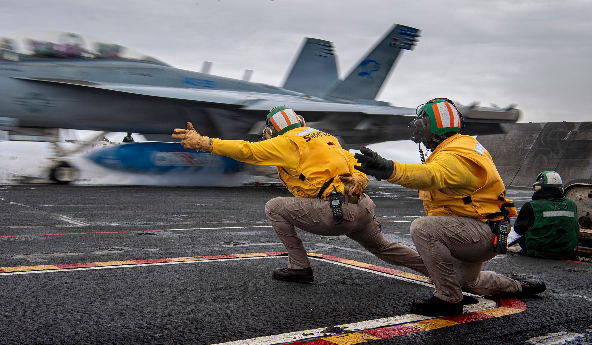 U.S. Navy sailors launch a F/A-18F Super Hornet attached to the “Kestrels” of Strike Fighter Squadron VFA-137 from the flight deck of the Nimitz-class aircraft carrier USS <i>Nimitz</i> (CVN-68), under way in the Pacific Ocean, April 13, 2026.