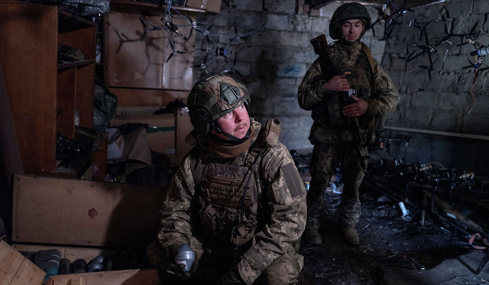 Service members of the 93rd Kholodnyi Yar Separate Mechanized Brigade of the Ukrainian Armed Forces check explosive devices for FPV-drones at a position on outskirts of the frontline town of Druzhkivka, Donetsk Region, Ukraine, April 7, 2026.