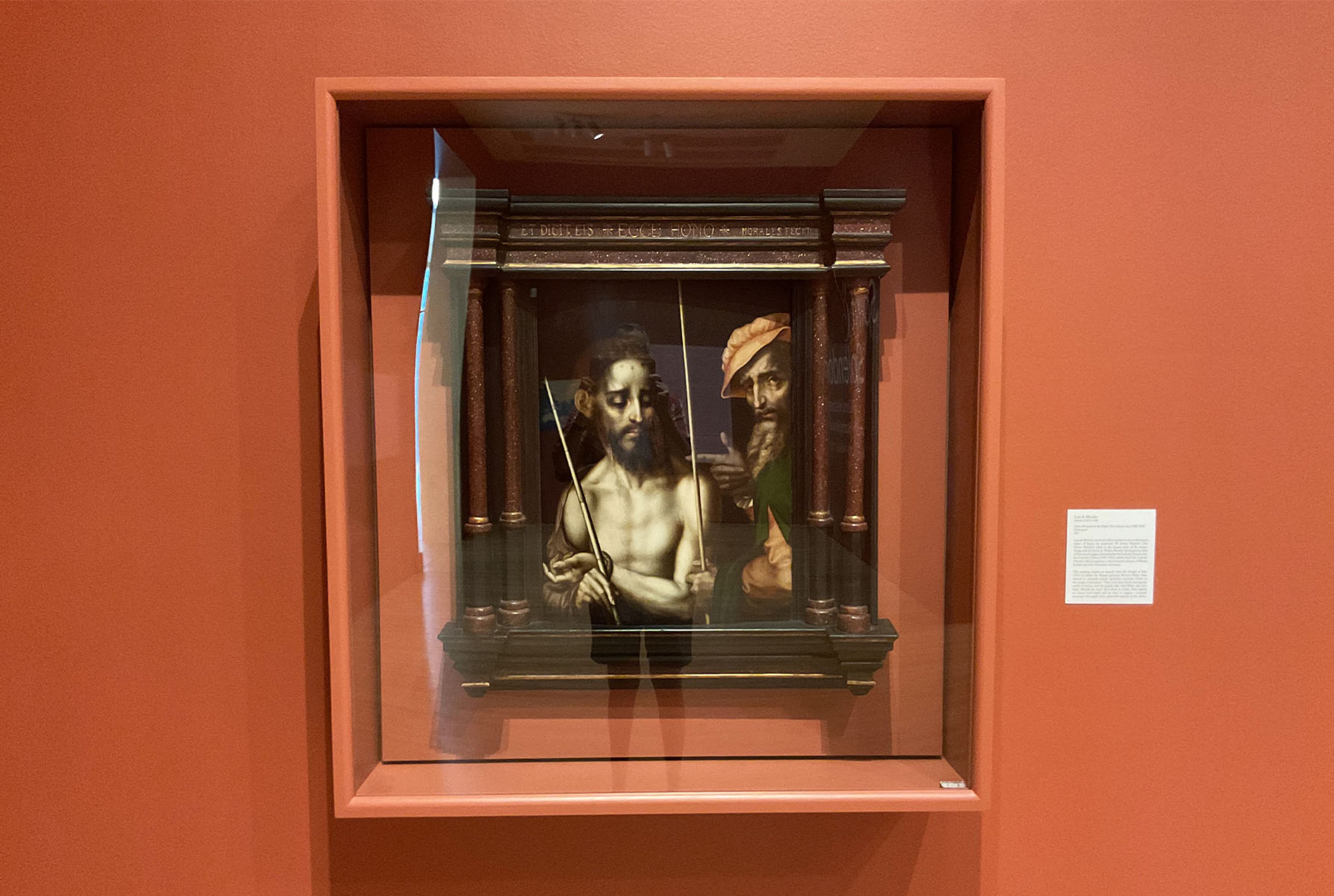 Glare that blares doesn’t suit this Morales painting, locked in a climate-controlled box.