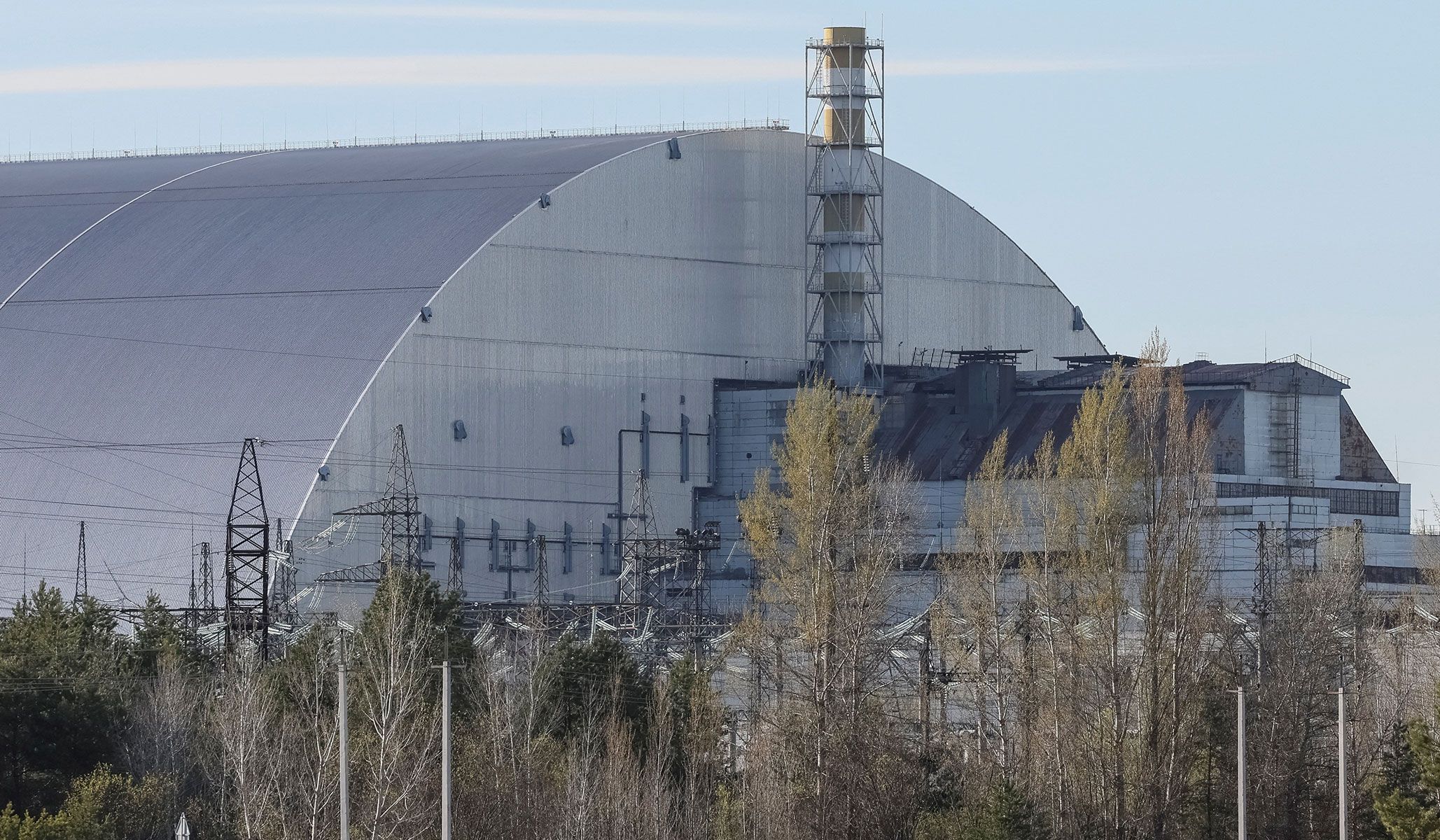 The New Safe Confinement Structure, that covers the old sarcophagus which confines the remains of the damaged fourth reactor at the Chernobyl nuclear power plant in Kyiv Region, Ukraine, April 22, 2026.
