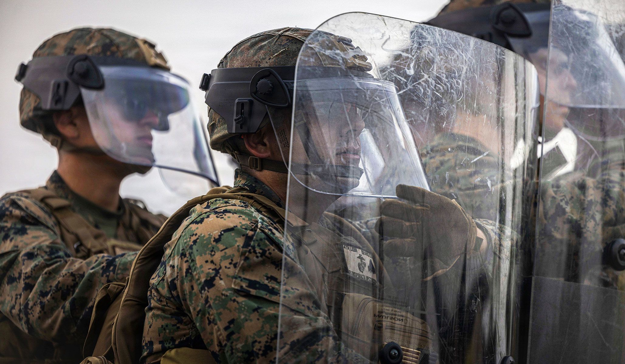 U.S. Marines with Third Marine Littoral Regiment, Third Marine Division, and Fourth Law Enforcement Battalion, Force Headquarters Group, Marine Forces Reserve, hold a shield line during Exercise Balikatan 2026 at Cagayan North International Airport, Cagayan, Philippines, April 21, 2026.