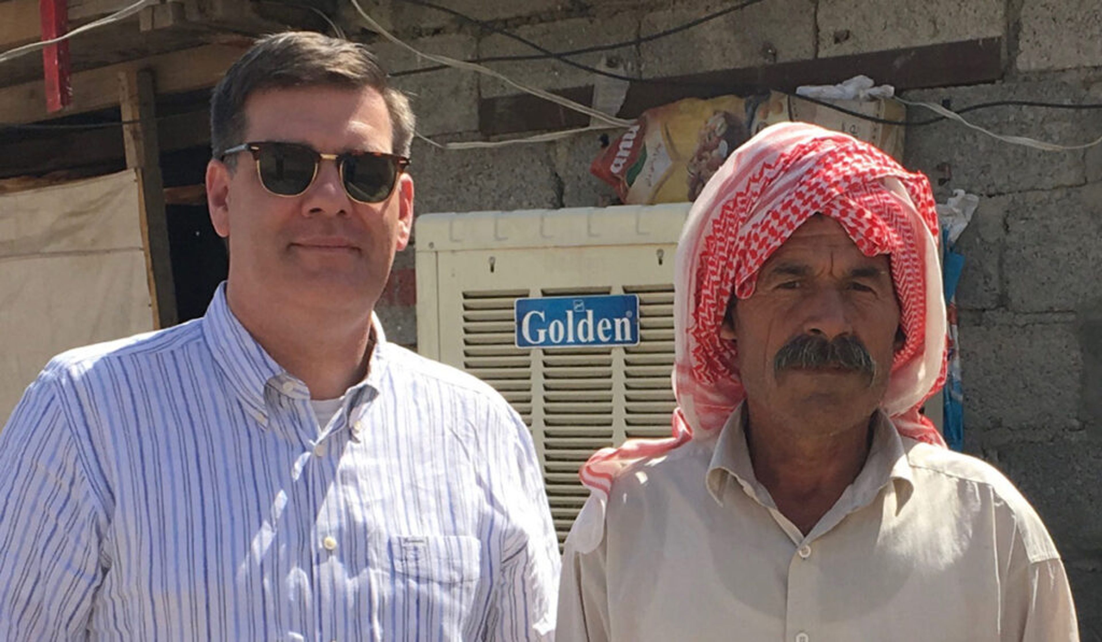 Andrew Walther with a displaced Yazidi elder in Iraq, 2016.