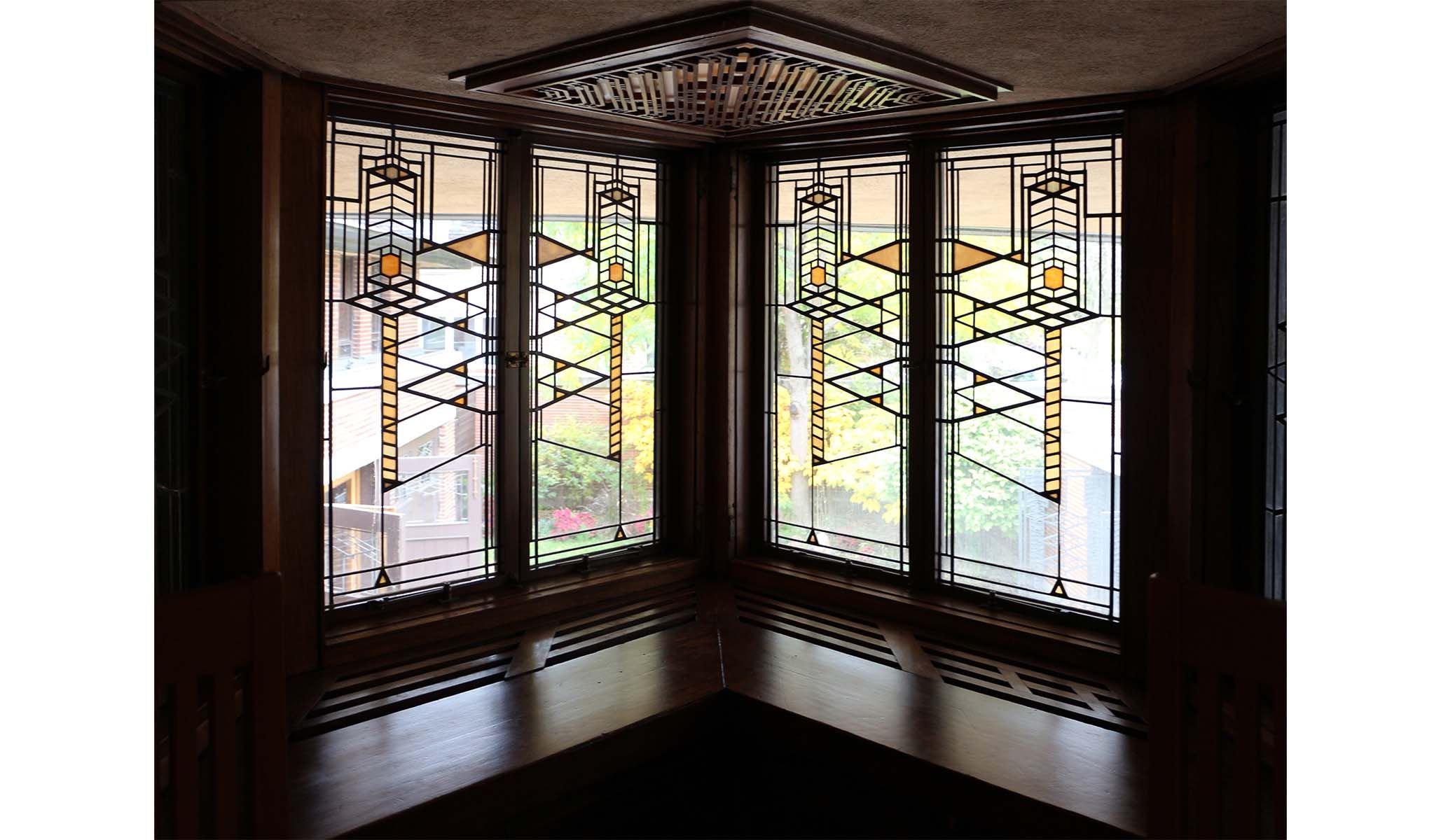 Wright used lots of stained glass in his houses, usually with earth colors rather than vibrant reds and blues. He thought this was more American.