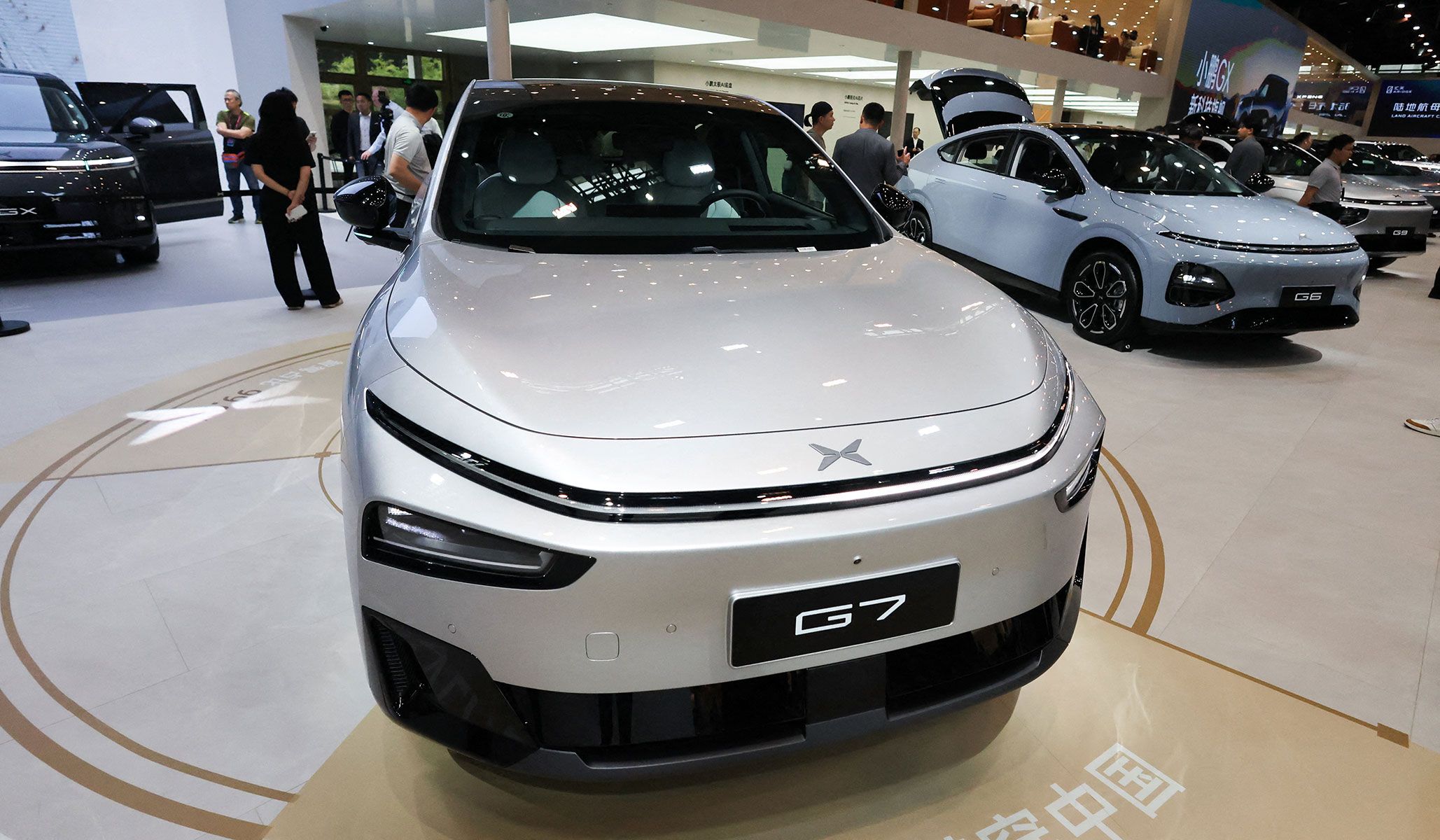 Xpeng G7 and G6 SUVs appear at the company’s booth at the Beijing International Automotive Exhibition in Beijing, China, April 24, 2026.