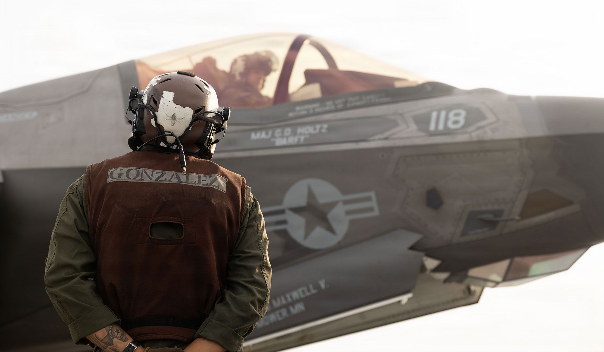 U.S. Marine Corps Corporal Andy Gonzalez, a powerline mechanic with the “Werewolves” of Marine Fighter Attack Squadron VMFA-122, 11th Marine Expeditionary Unit, oversees pre-flight checks during flight operations aboard the Wasp-class amphibious assault ship USS <i>Boxer</i> (LHD-4), under way in the Pacific Ocean, April 17, 2026.