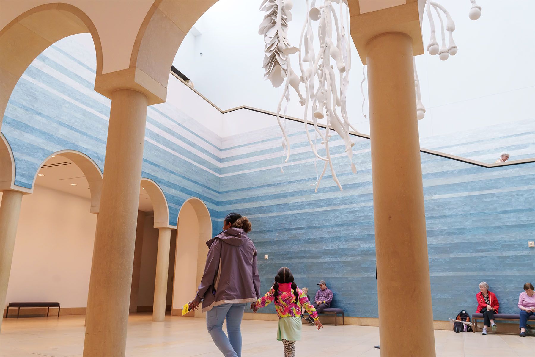 A family explores the Blanton Museum.