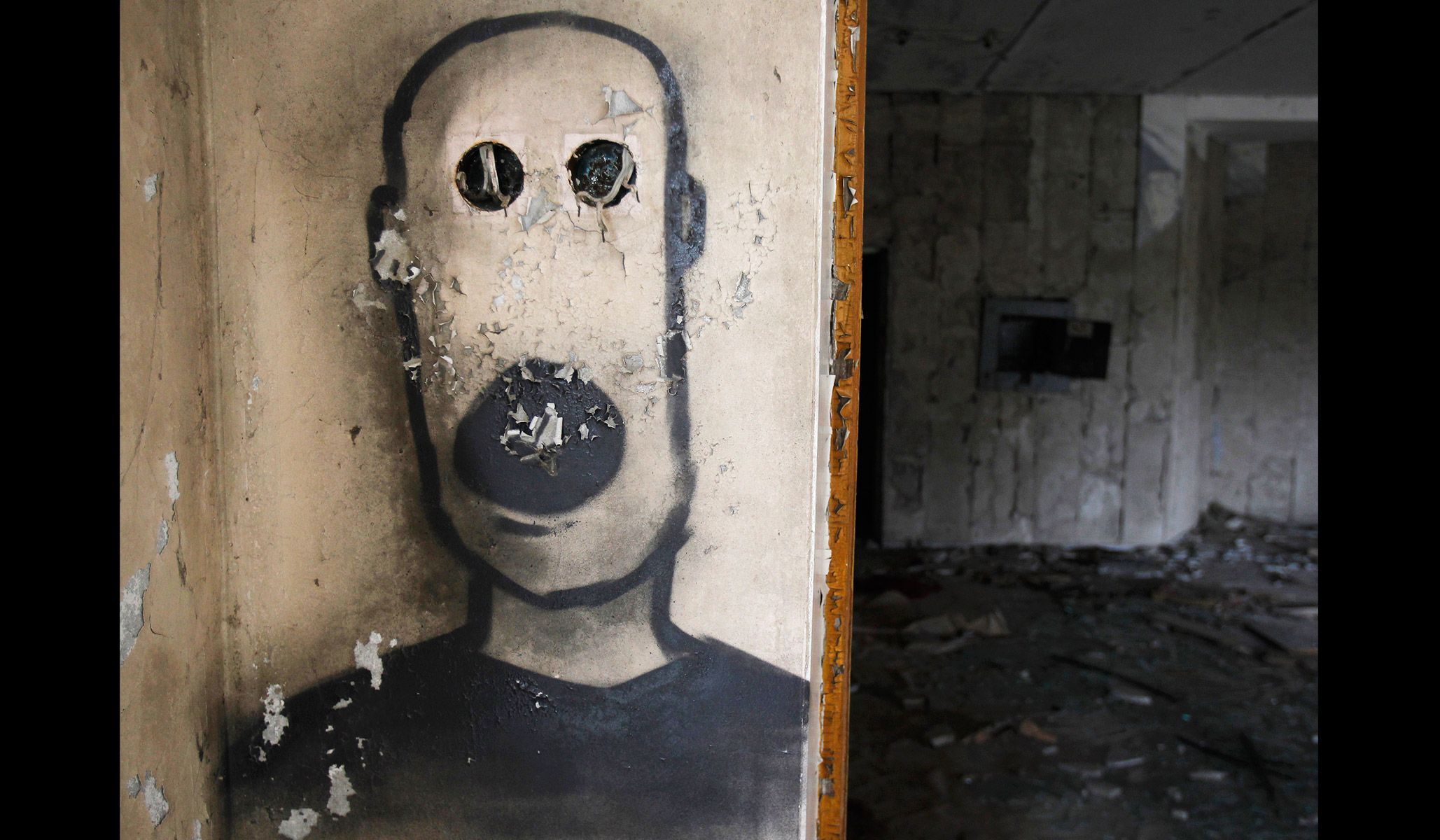 Graffiti inside a building in the abandoned city of Pripyat near the Chernobyl nuclear power plant, March 31, 2011.