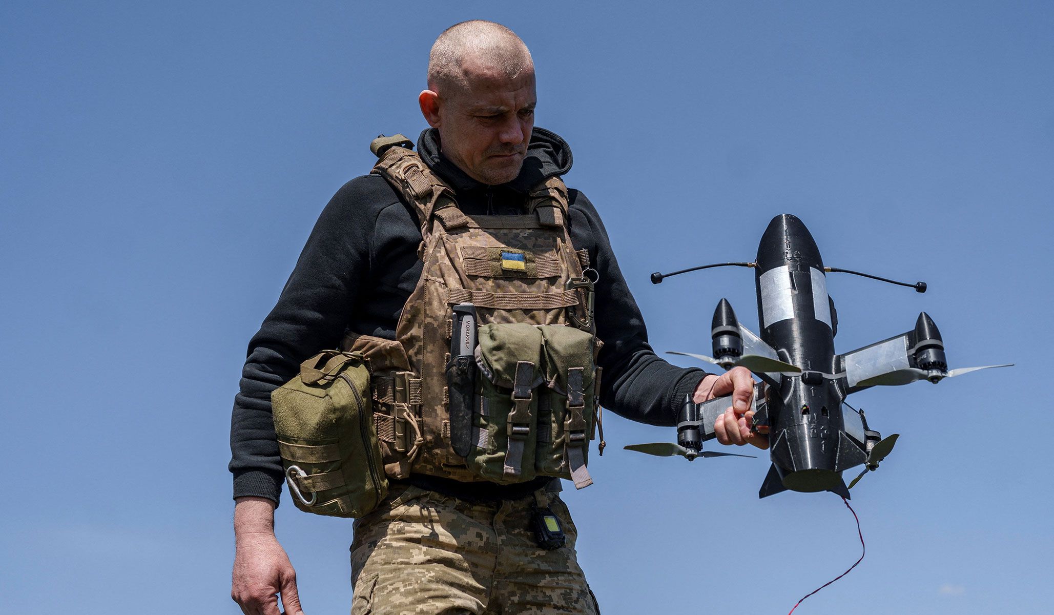 A serviceman of an air defense unit of the 24th Separate Mechanized Brigade of the Ukrainian Armed Forces prepares a P1-Sun FPV interceptor drone for a launch near the frontline in Donetsk Region, Ukraine, April 26, 2026.