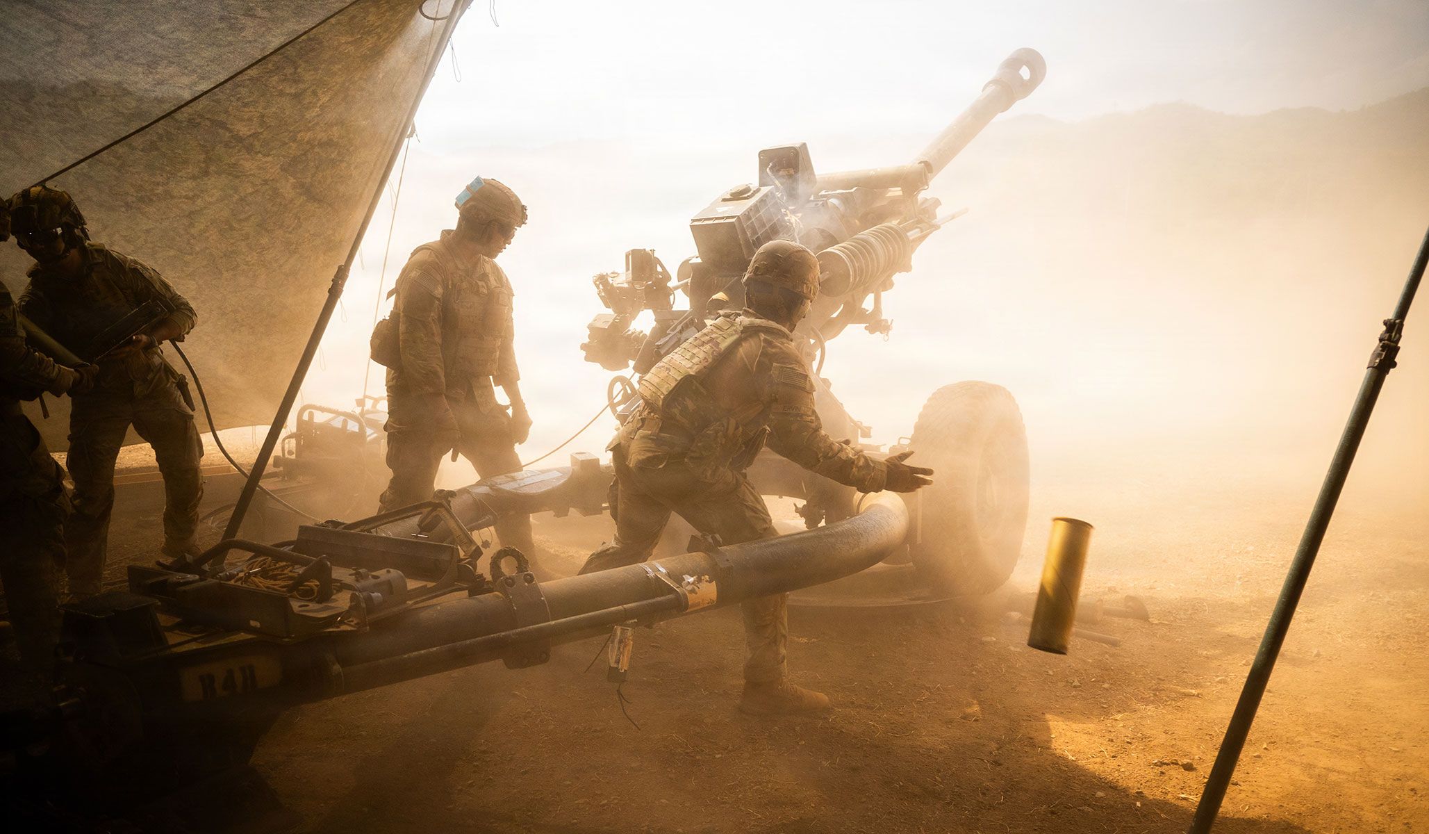 A U.S. Army artillery crew member assigned to Third Battalion, Seventh Field Artillery Regiment, 25th Infantry Division, extracts an expended 105mm shell casing during Exercise Salaknib 26 at Fort Magsaysay Combat Readiness Training Area, Canantong, Nueva Ecija, Philippines, April 17, 2026.