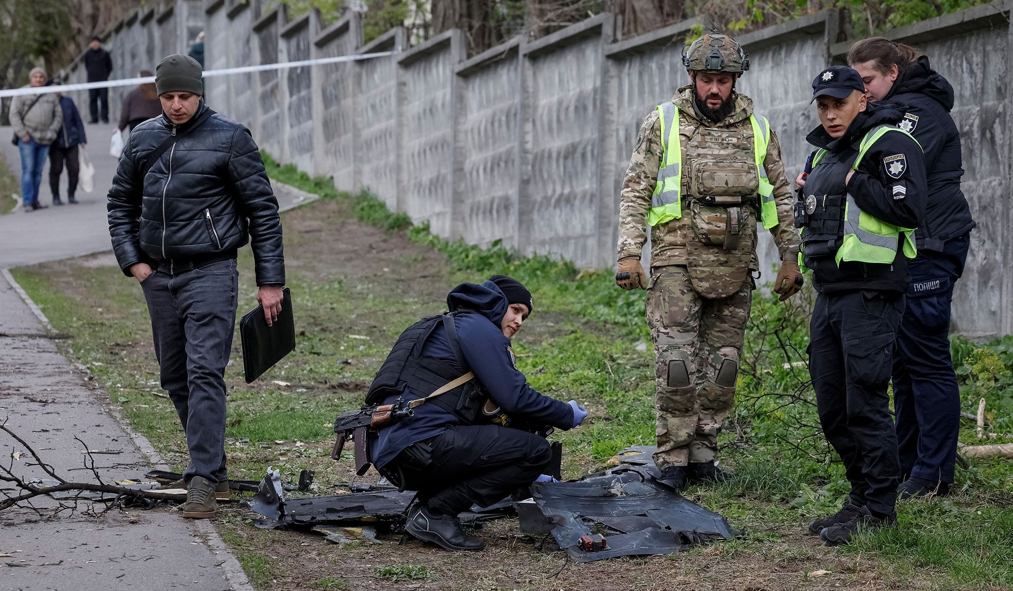 A police expert works at the site of a Russian drone strike in Kyiv, Ukraine, April 28, 2026.