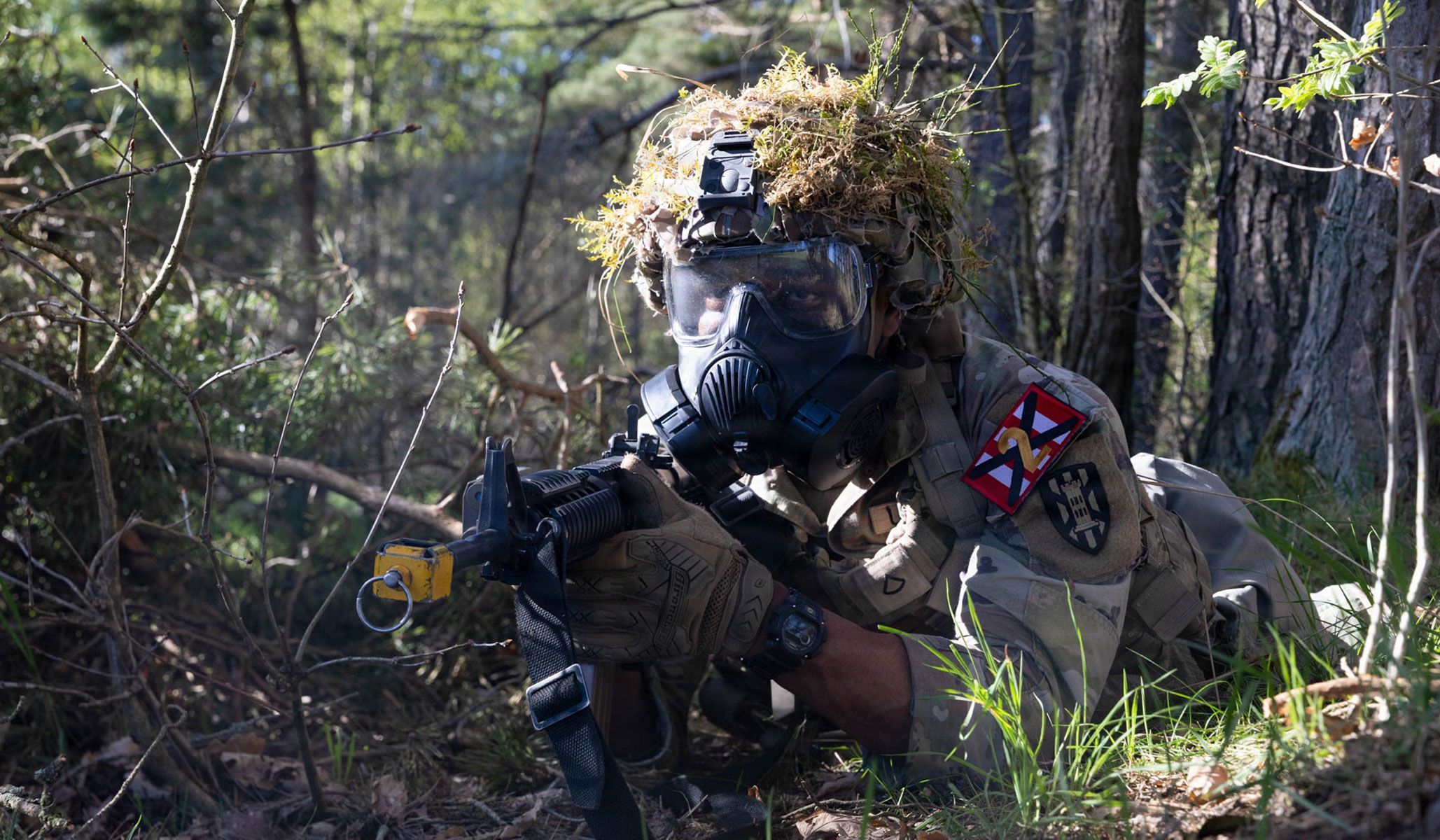 U.S. Army Private First Class Cleopheus Lane, a combat engineer assigned to the Seventh Engineer Brigade, pulls security during the chemical, biological, radiological, nuclear, and explosives lane of the Skill Level Two event at the 21st Theater Sustainment Command Best Squad Competition at the Grafenwoehr Training Area, Germany, April 22, 2026.