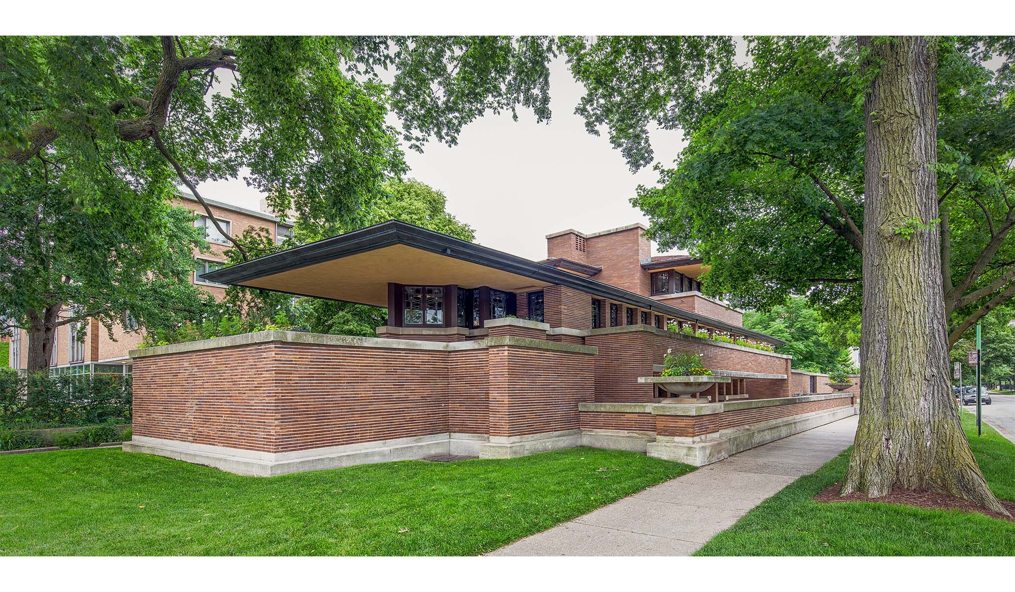 Low-slung and rambling, the Robie House was thought by Wright to be the triumph of his Prairie Style.