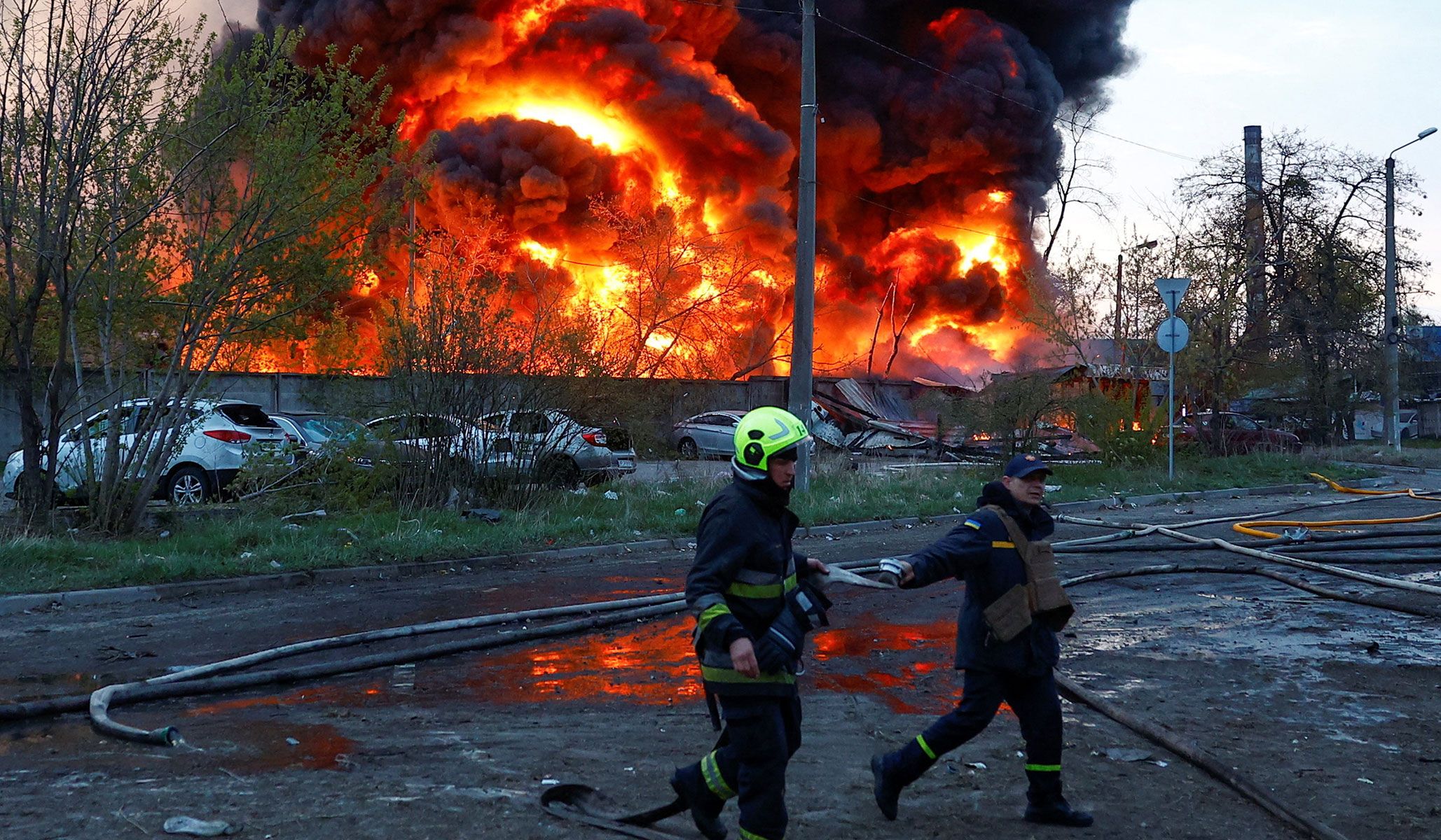 Firefighters work at the site of a recyclable materials warehouse hit by a Russian missile strike in Kyiv, Ukraine, April 16, 2026.