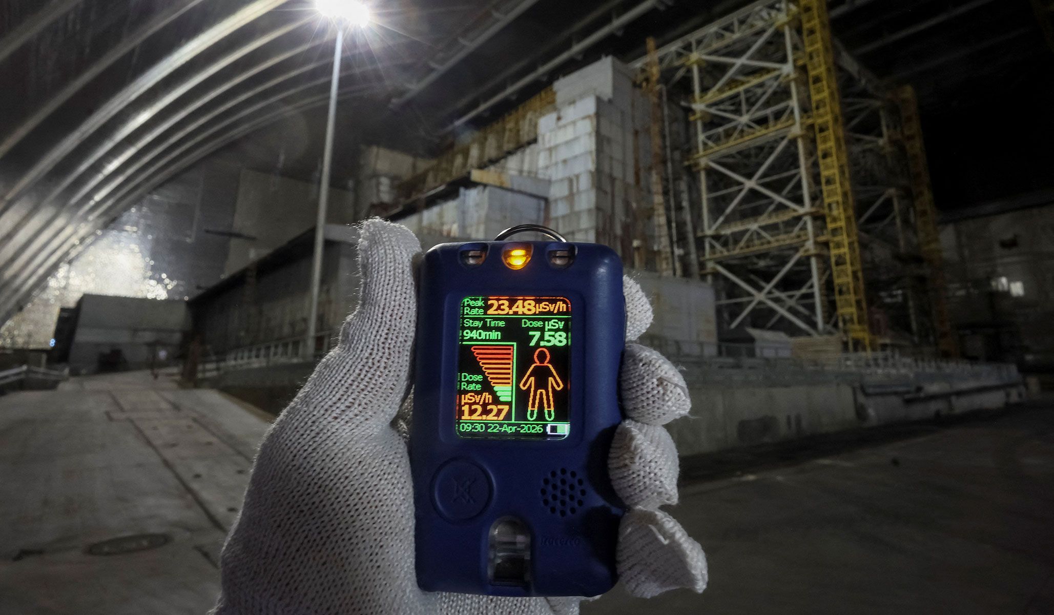 Radiation level seen on a monitor of a dosimeter next to the old sarcophagus covering the damaged fourth reactor, under the New Safe Confinement Structure at the Chernobyl nuclear power plant in Kyiv Region, Ukraine, April 22, 2026.