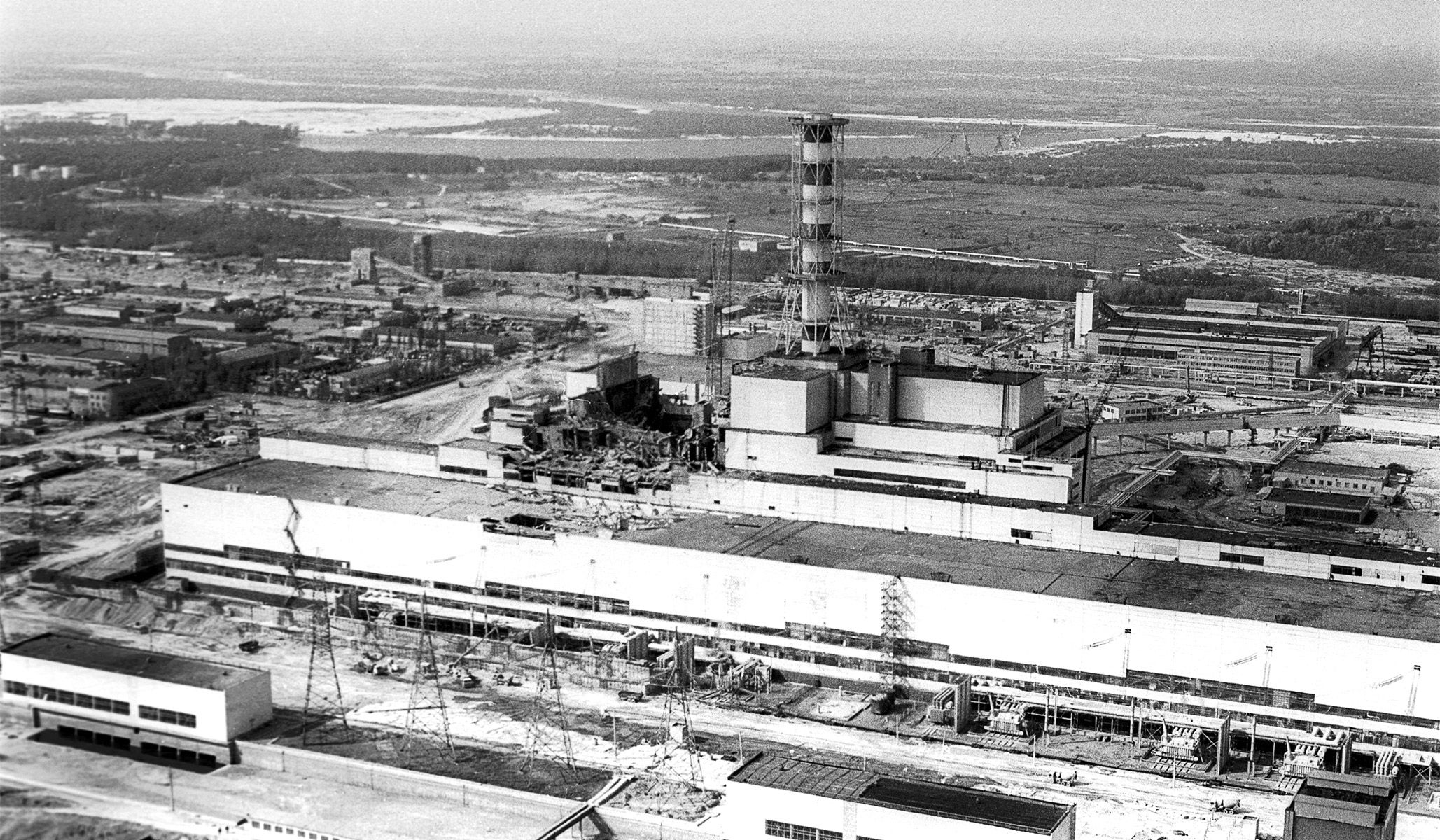 The Chernobyl nuclear power plant after the explosion of its fourth reactor, 1986.