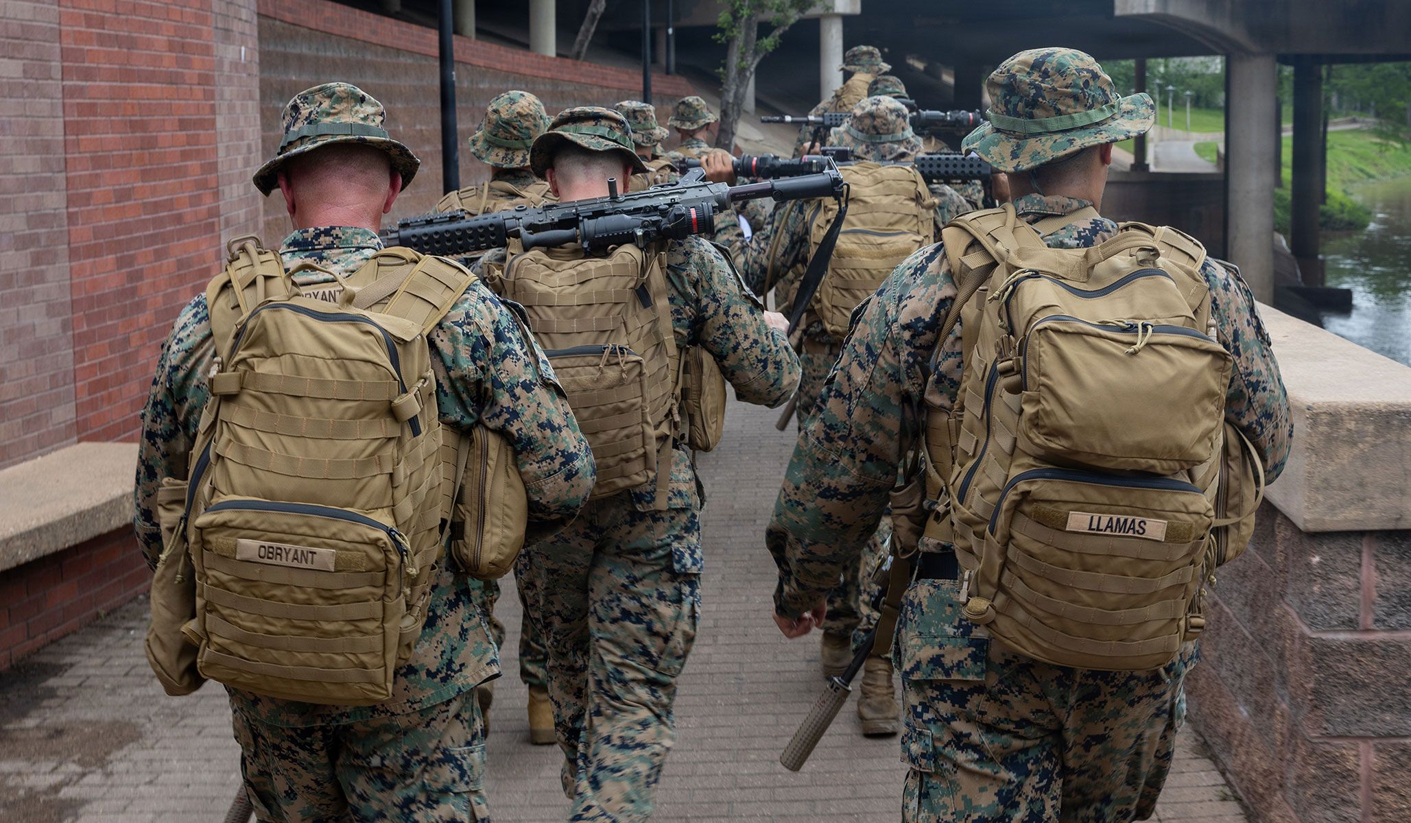 U.S. Marines from First Battalion, 23rd Marines, march through Allen's Landing to deliver a flag at the opening ceremony of Fleet Week Houston 2026 in Houston, Texas, April 15, 2026.