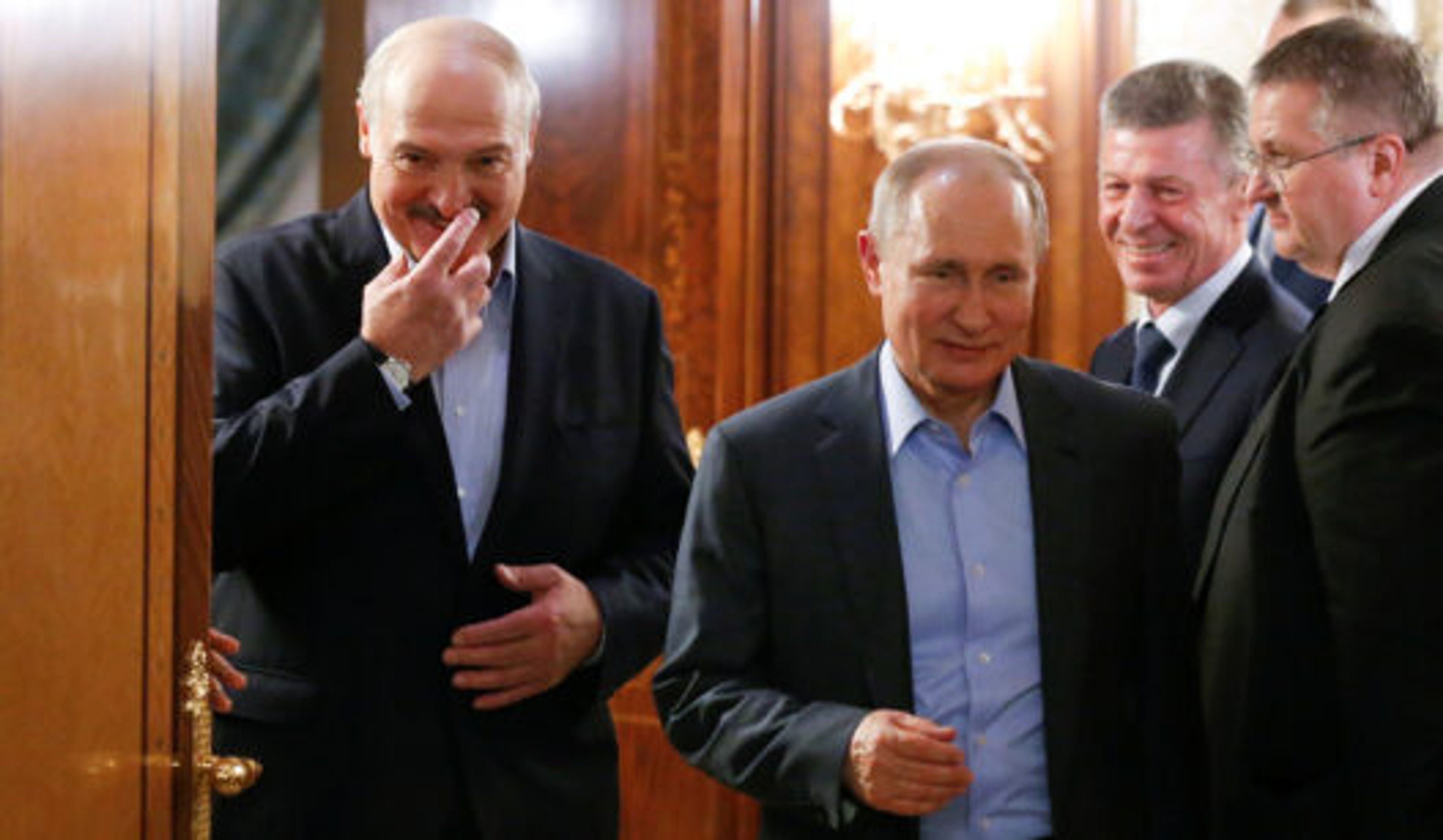 Russian President Vladimir Putin and Belarusian President Alexander Lukashenko walk during their meeting in the Black sea resort of Sochi, Russia, February 7, 2020.