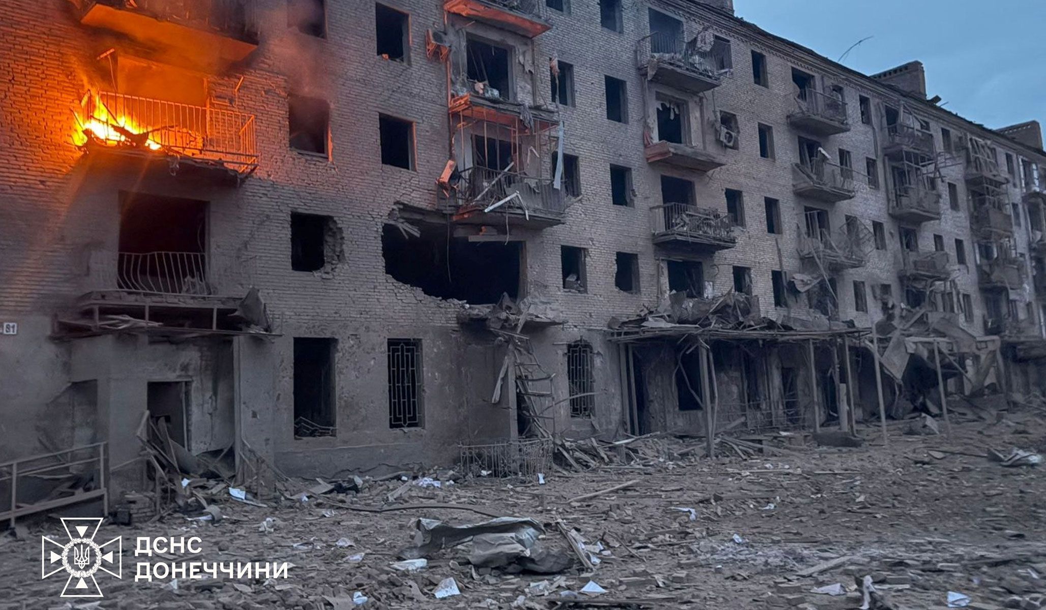 Smoke and fire rise from an apartment building, which was hit during a Russian airstrike in Sloviansk, Donetsk Region, Ukraine, April 15, 2026.