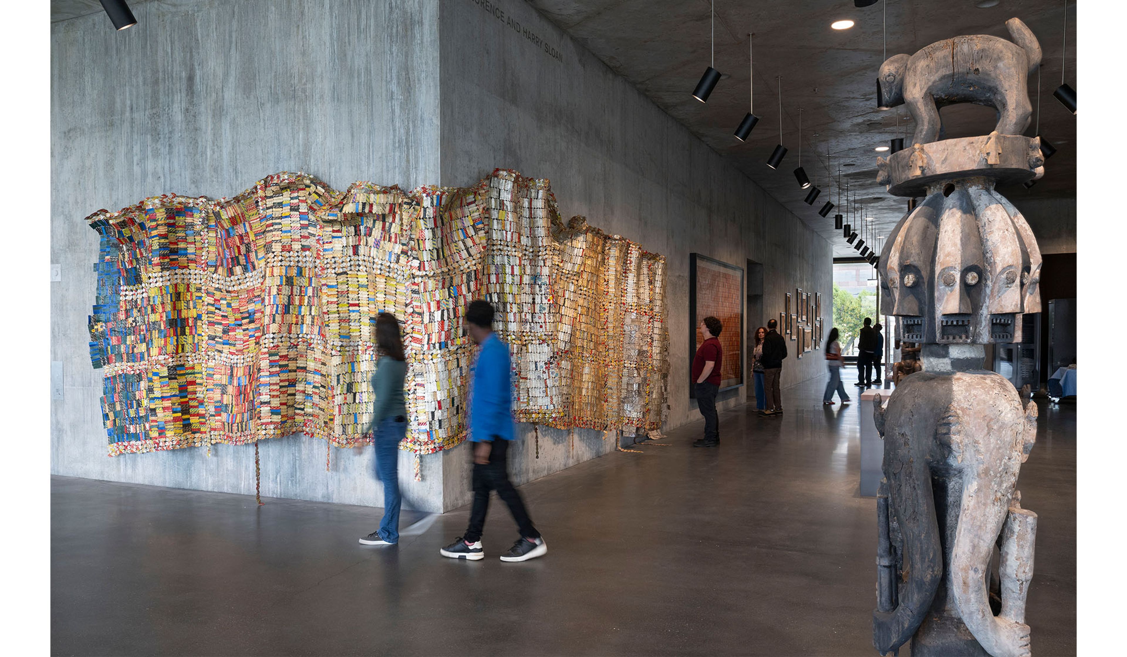 Installation view featuring El Anatsui’s Fading Scroll .