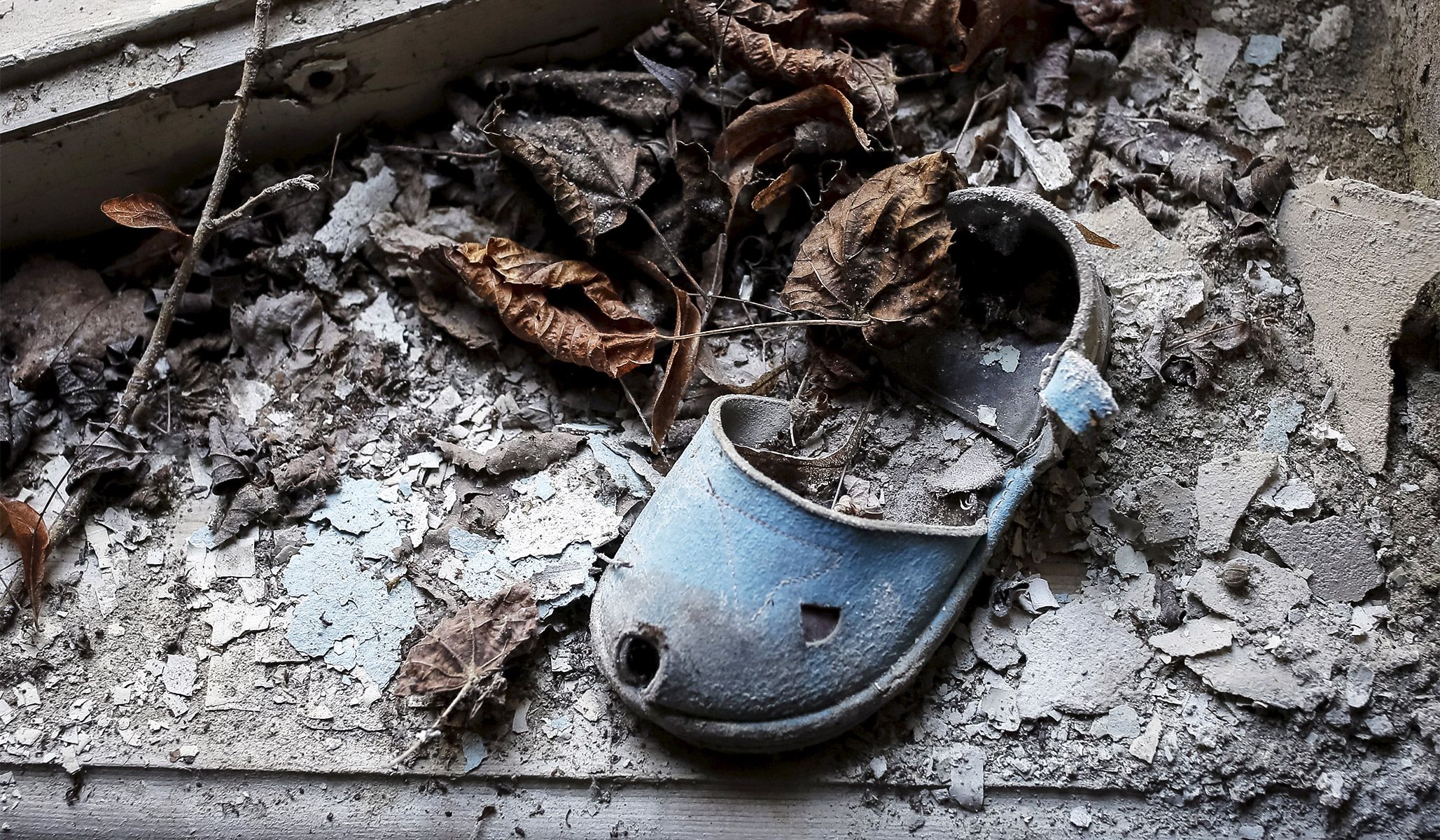 A child’s shoe in a kindergarten in the abandoned city of Pripyat near the Chernobyl nuclear power plant in Ukraine, March 28, 2016.