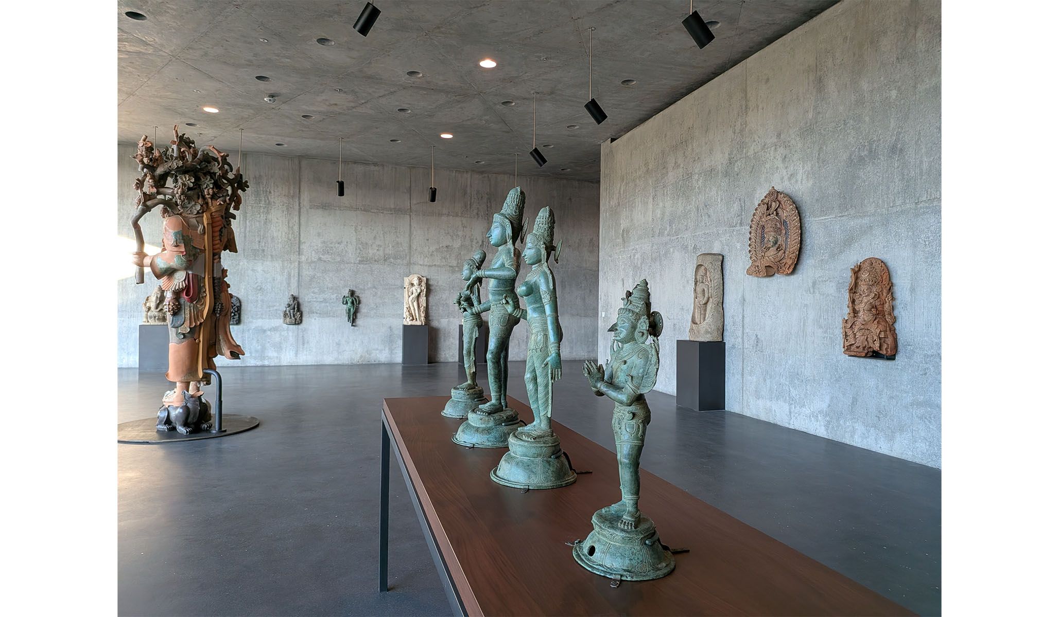 Installation view of ancient Asian sculpture.