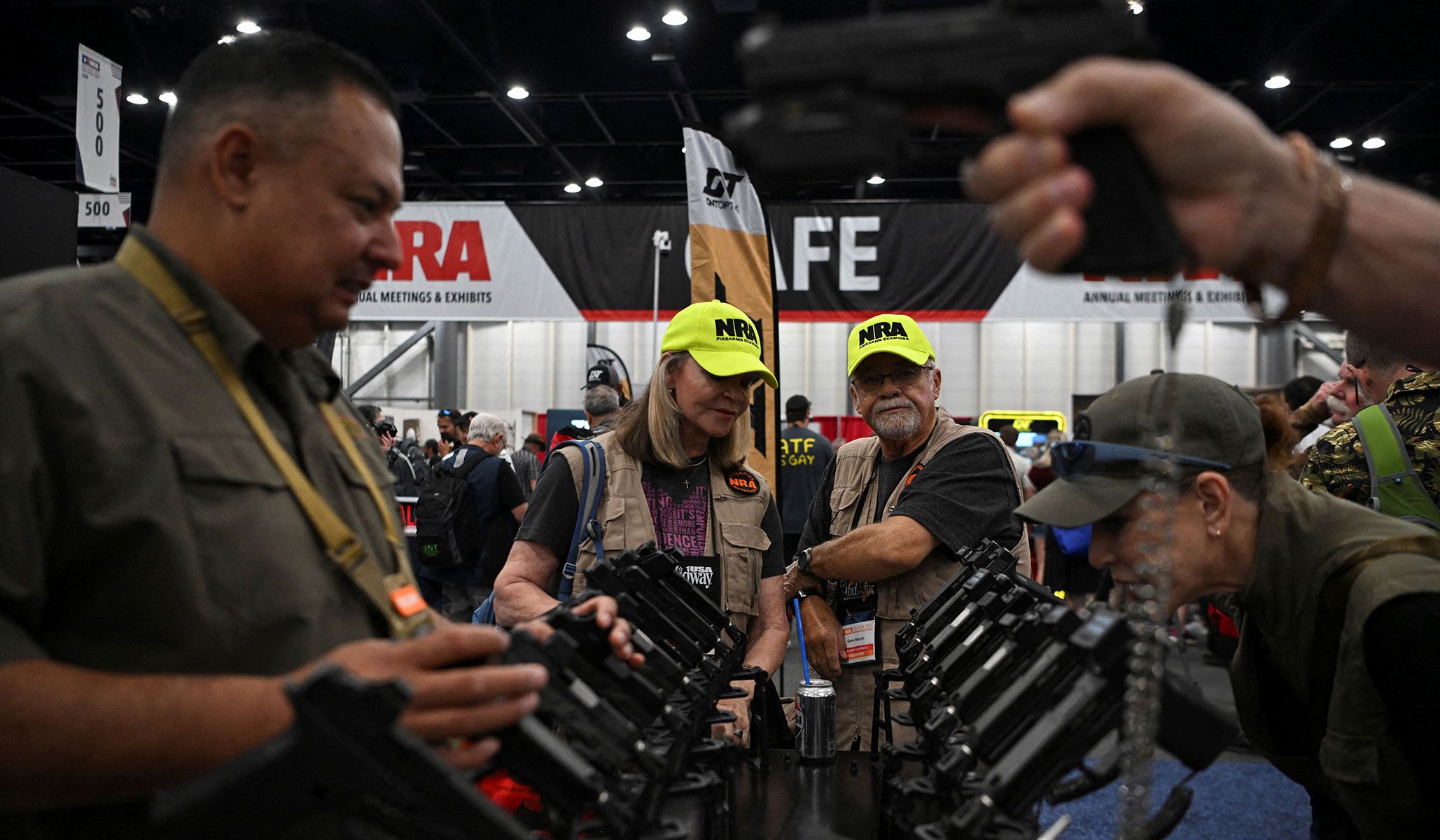 People attend the the NRA annual meetings and exhibits in Houston, Texas, April 18, 2026.