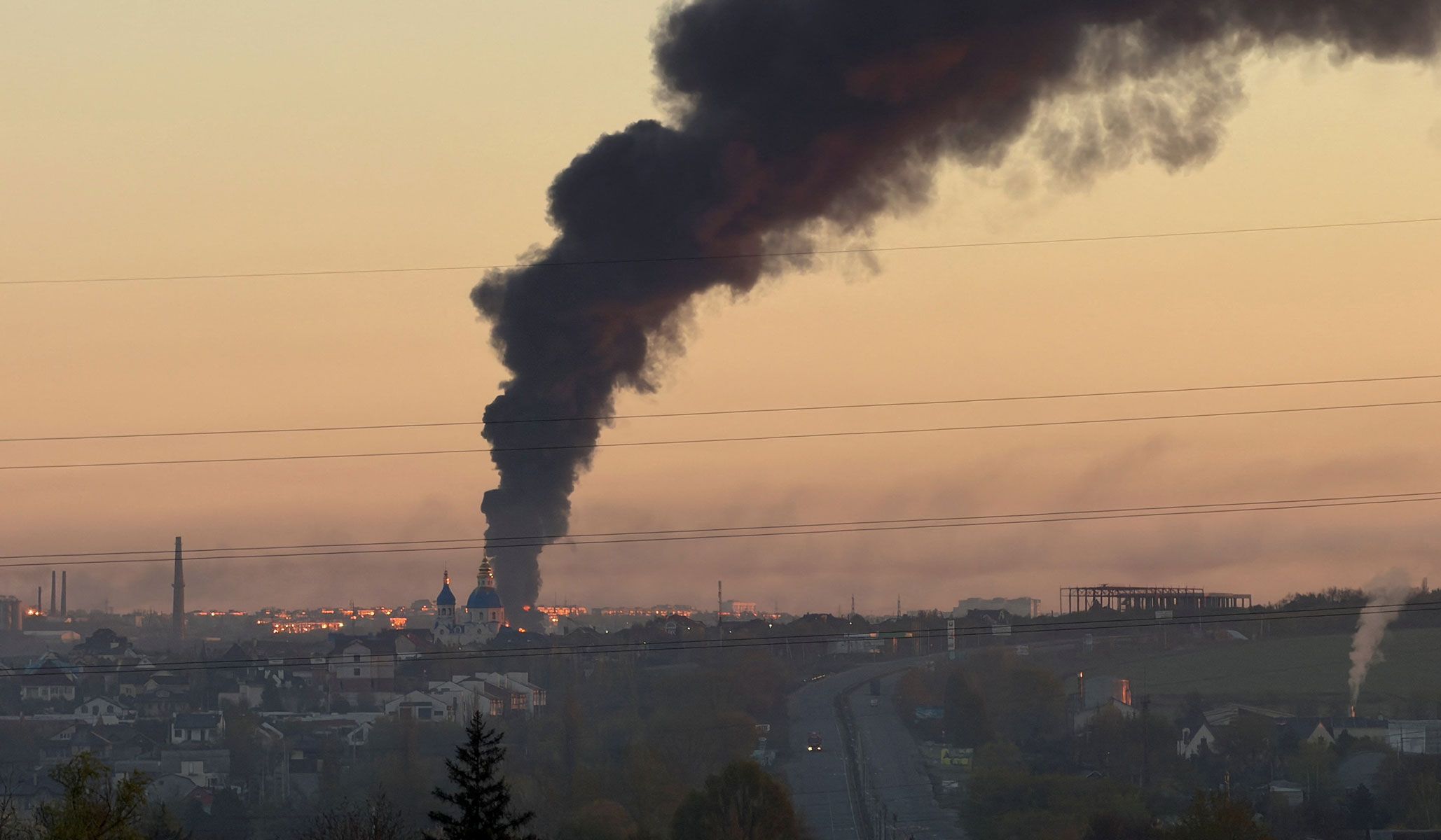Smoke rises in the city after a Russian drone and missile strike in Dnipro, Ukraine, April 25, 2026. Picture taken with a mobile phone.