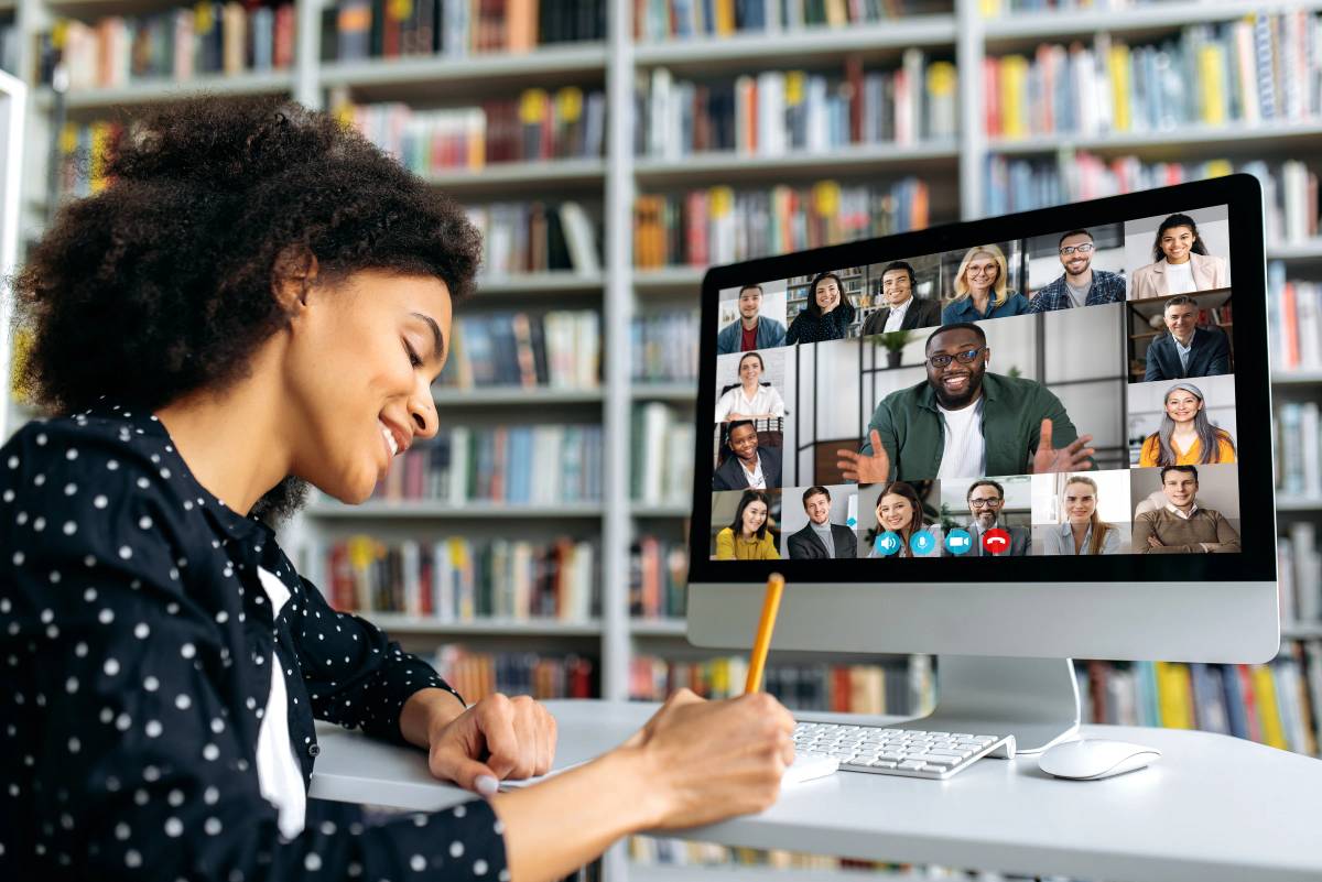 Teaching student attending an online class.