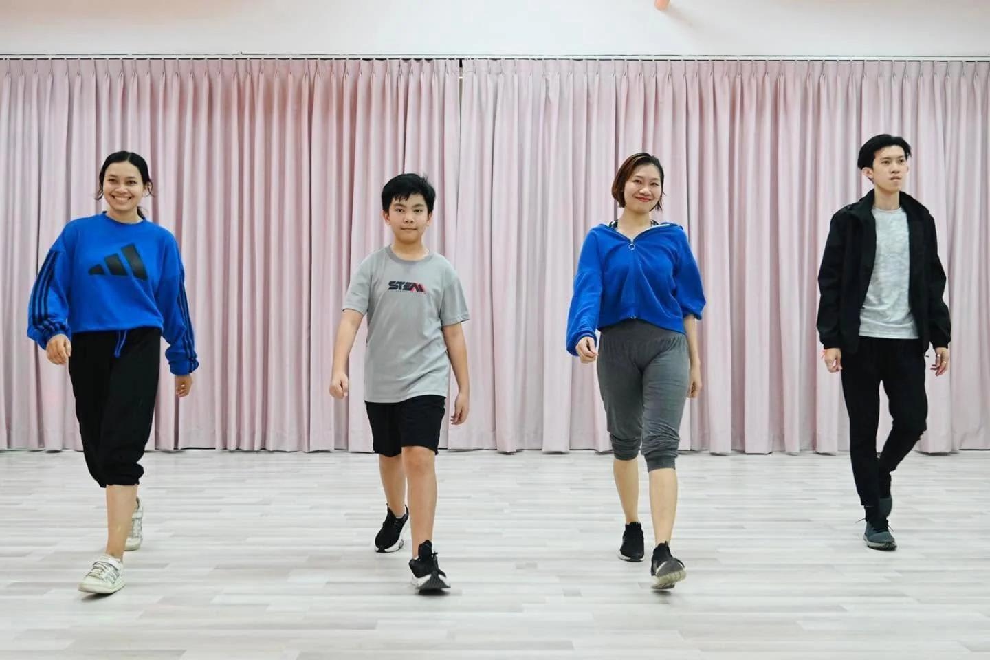 Participants practise a Zumba routine in AAA’s dance studio.