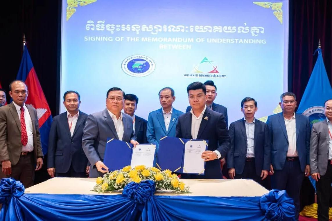 Representatives of AAA School and CHEA at the memorandum of understanding signing.