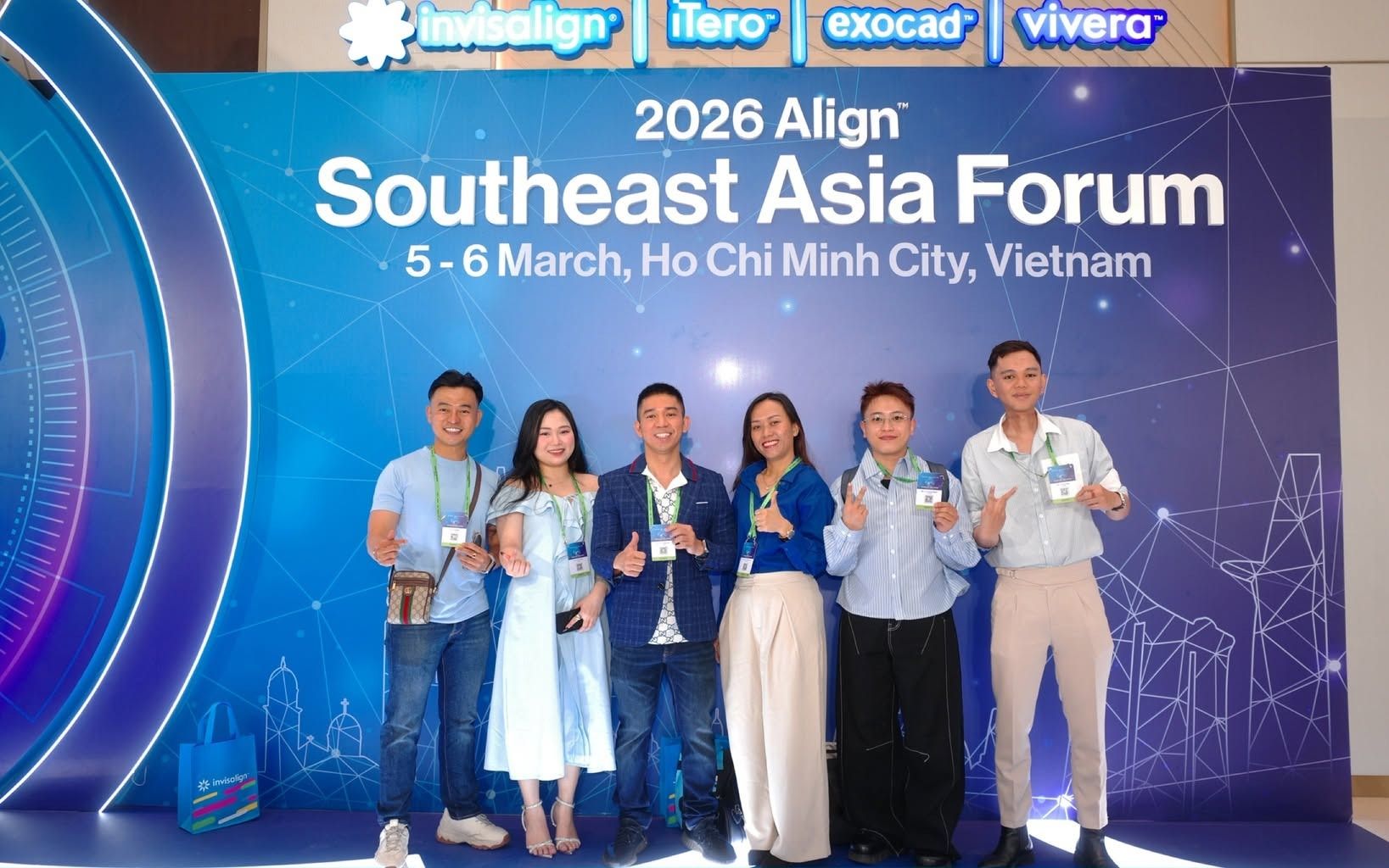 Sáu người đeo thẻ tham dự đứng trước phông nền ghi “2026 Align Southeast Asia Forum — 5-6 March, Ho Chi Minh City, Vietnam”.