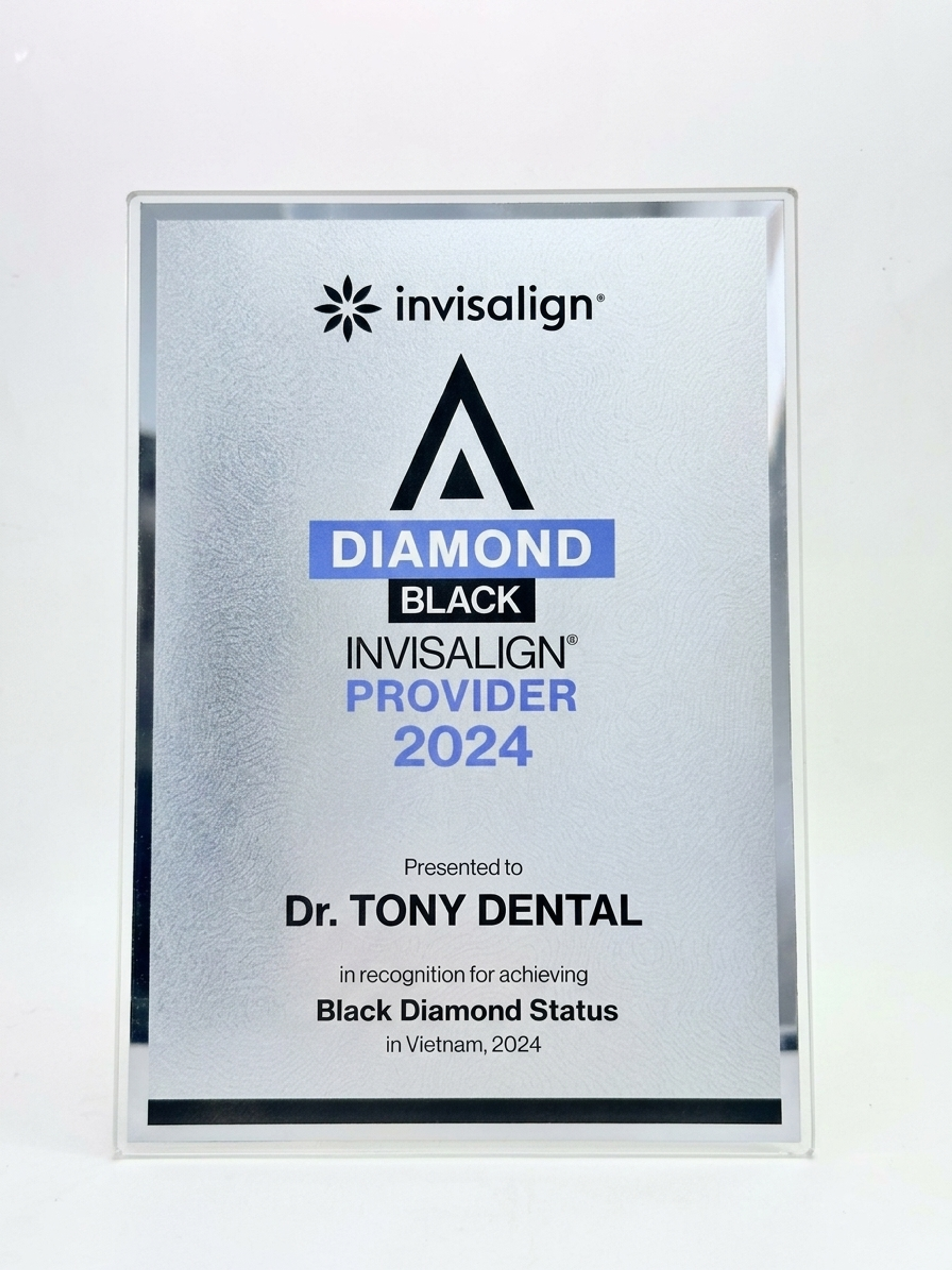 The Invisalign Diamond Black Provider 2024 plaque presented to Dr. Tony Dental, in recognition of achieving Black Diamond Status in Vietnam, 2024