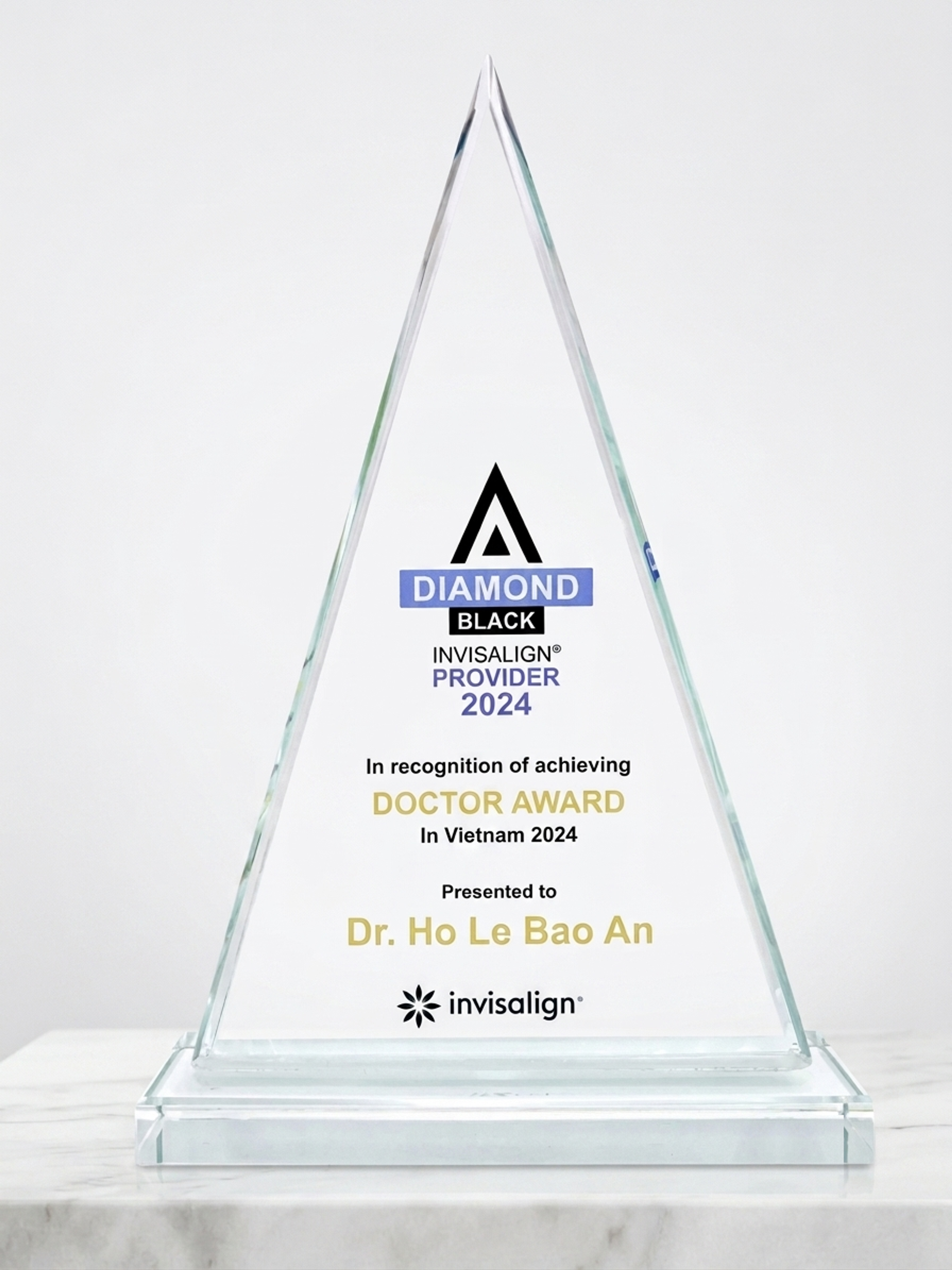 The Invisalign Diamond Black Provider 2024 trophy presented to Dr Ho Le Bao An, engraved Doctor Award in Vietnam, 2024